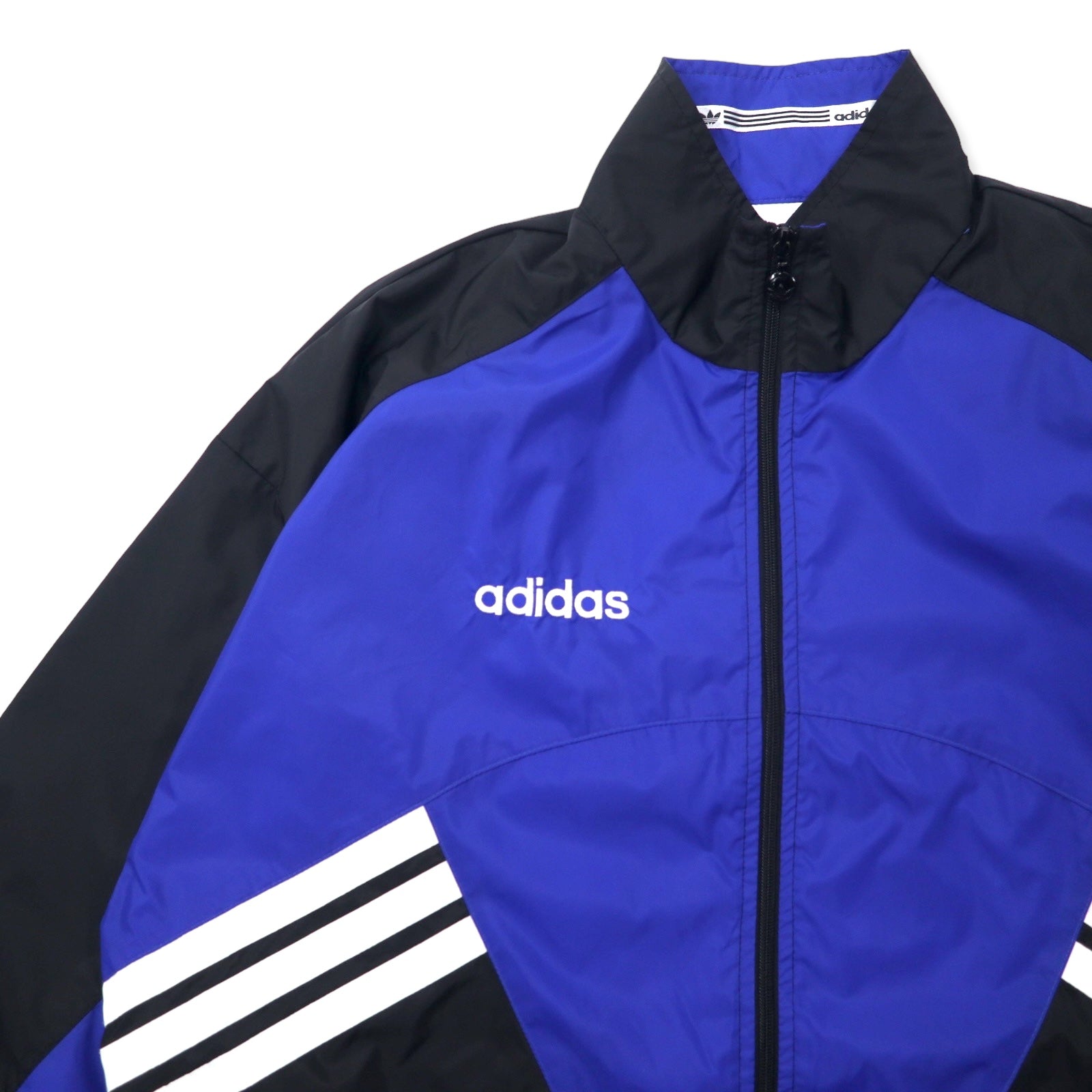 Giacca a vento Adidas anni '90, nylon, blu, nero, coulisse, etichetta argento, logo Trifoglio, oversize