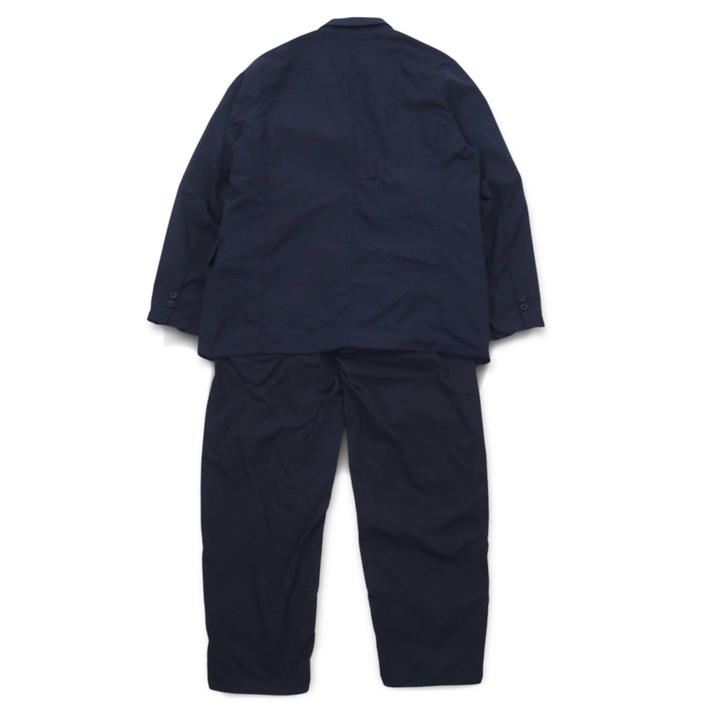 Completo TEATORA DEVICE JKT / WALLET PANTS taglia L, colore blu navy, in nylon PACKABLE, modelli TT-004-P / TT-203-P, Made in Japan.