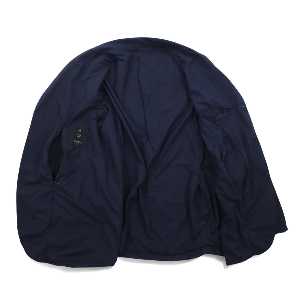 Completo TEATORA DEVICE JKT / WALLET PANTS taglia L, colore blu navy, in nylon PACKABLE, modelli TT-004-P / TT-203-P, Made in Japan.