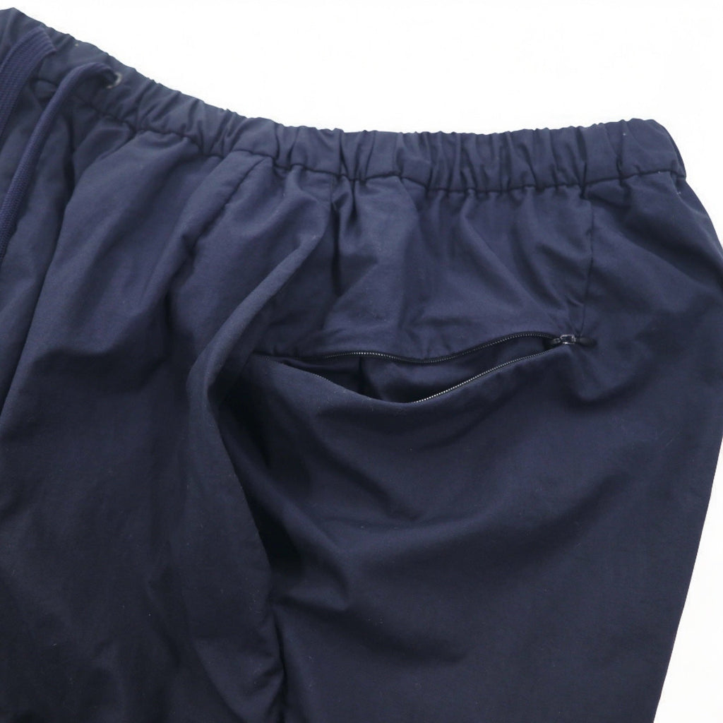 Completo TEATORA DEVICE JKT / WALLET PANTS taglia L, colore blu navy, in nylon PACKABLE, modelli TT-004-P / TT-203-P, Made in Japan.