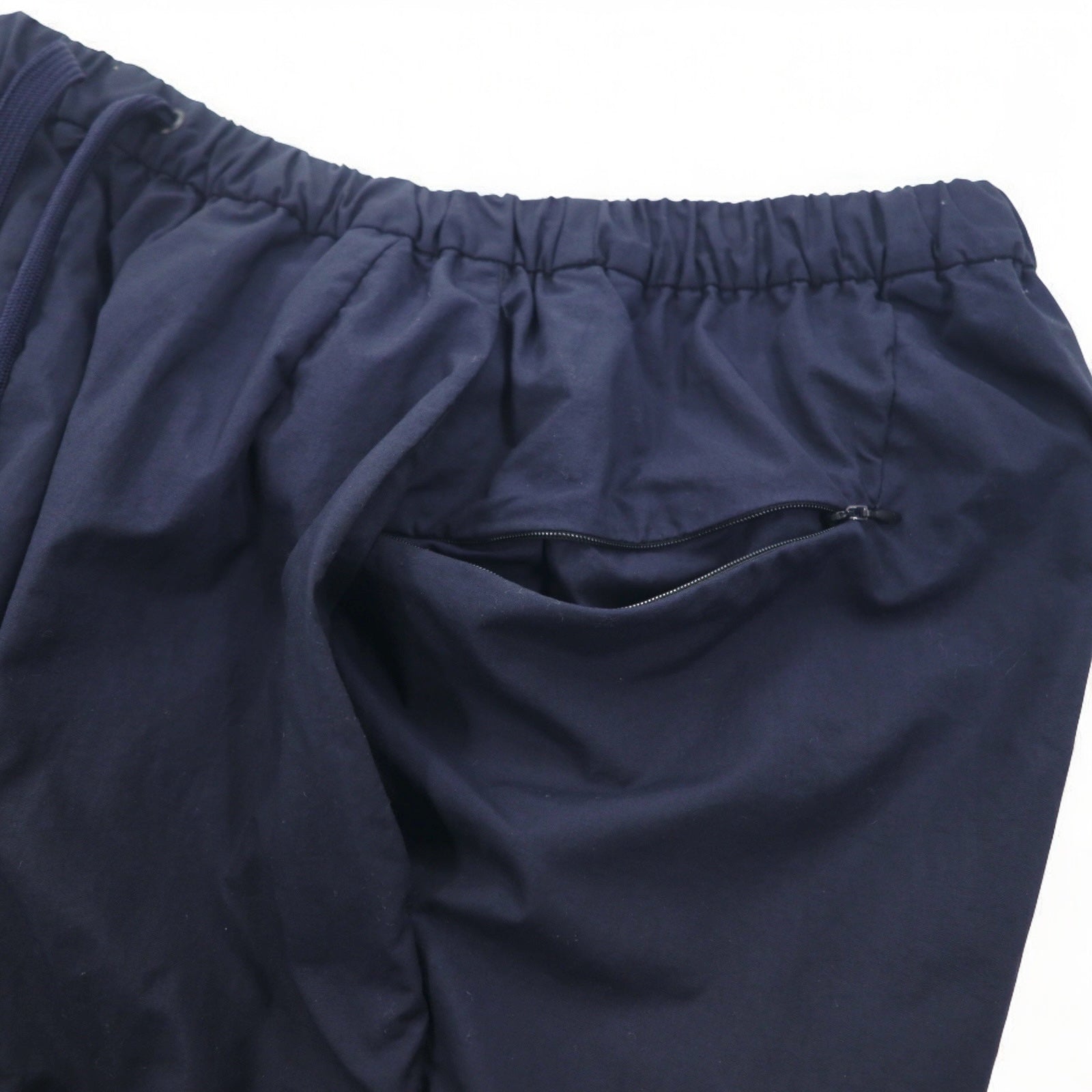 Completo TEATORA DEVICE JKT / WALLET PANTS taglia L, colore blu navy, in nylon PACKABLE, modelli TT-004-P / TT-203-P, Made in Japan.