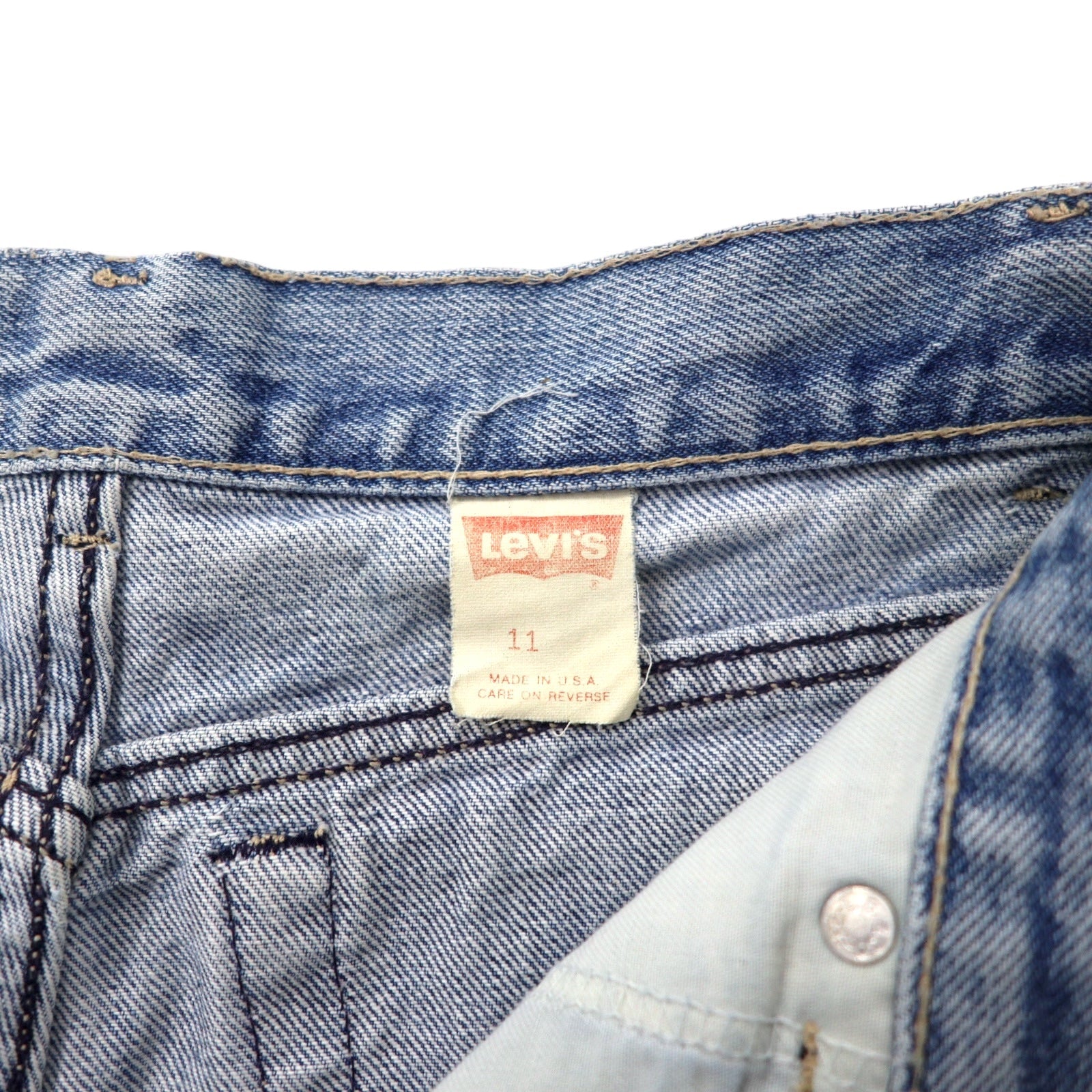 Levi's Made in USA anni '80 Jeans a vita alta affusolati in denim 11 blu ice wash cotone bottone sul retro 573 linguetta bianca 57902-7206
