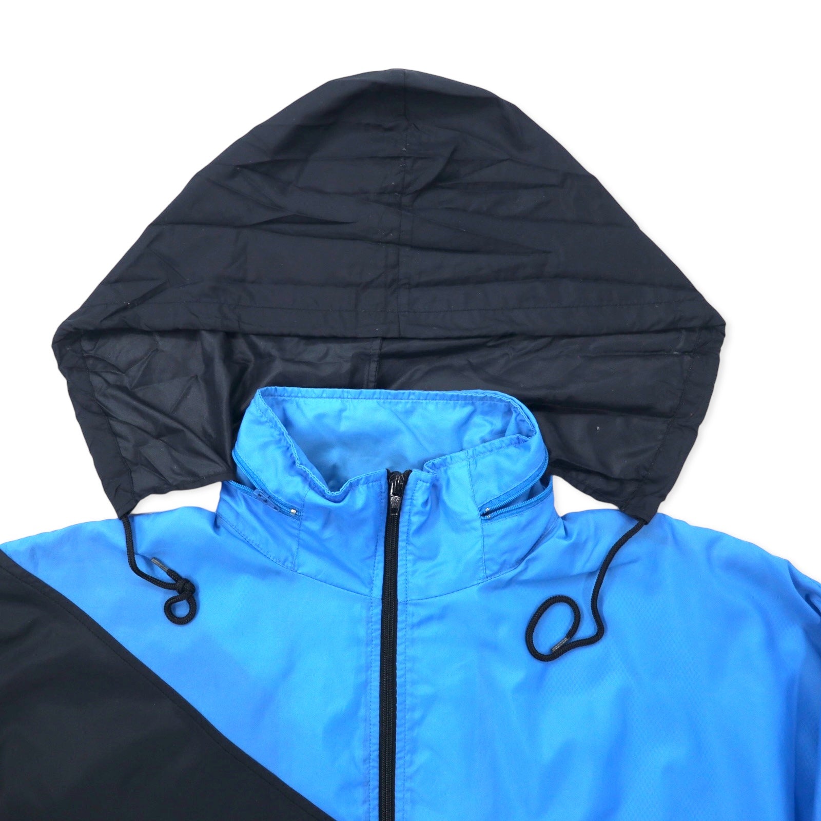 Reebok SPORT Giacca in nylon anni '90, taglia M, blu e nera, cappuccio ripiegabile, logo ricamato sul retro