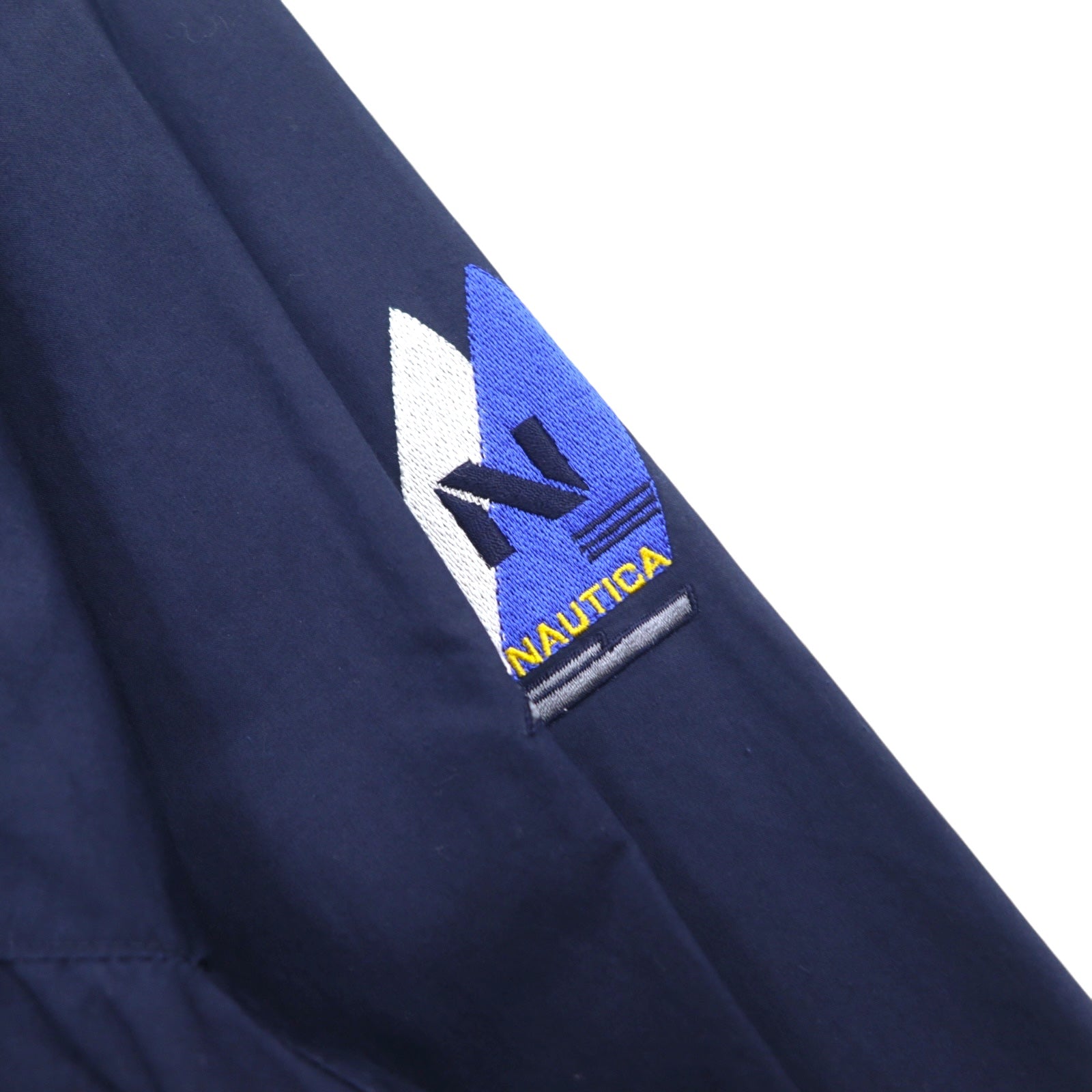Giacca a vela Nautica anni '90, giacca a vento in nylon, taglia XL, blu navy, cotone, cappuccio a scomparsa, logo ricamato.