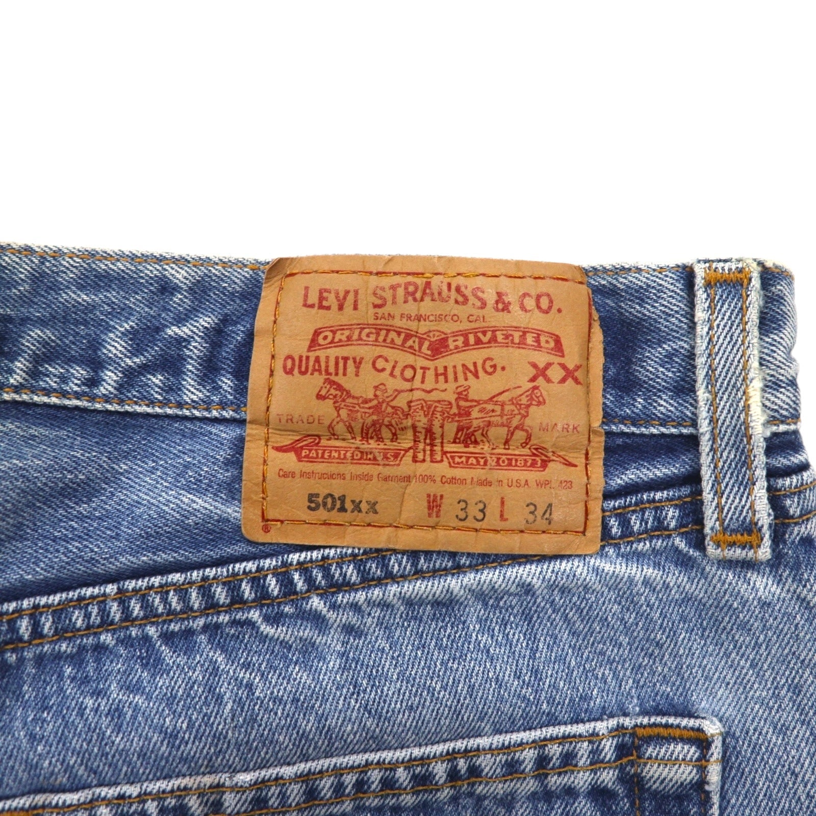 Levi's anni '90, Made in USA, 501XX, shorts in denim cut-off, taglia M, indaco blu, bottone 553, 501-0000