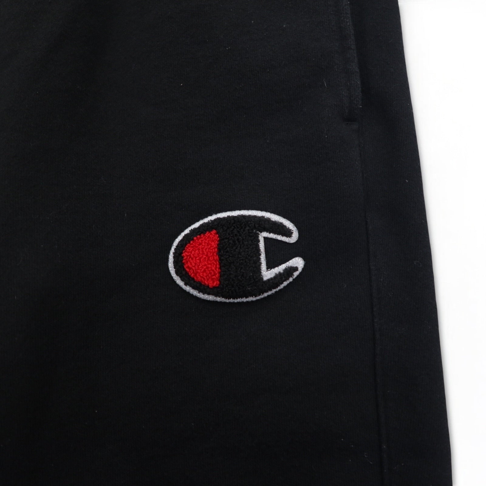 Champion Reverse Weave Pantaloni della tuta L Neri Logo Script Etichetta blu singola Replica Fabbricati a El Salvador