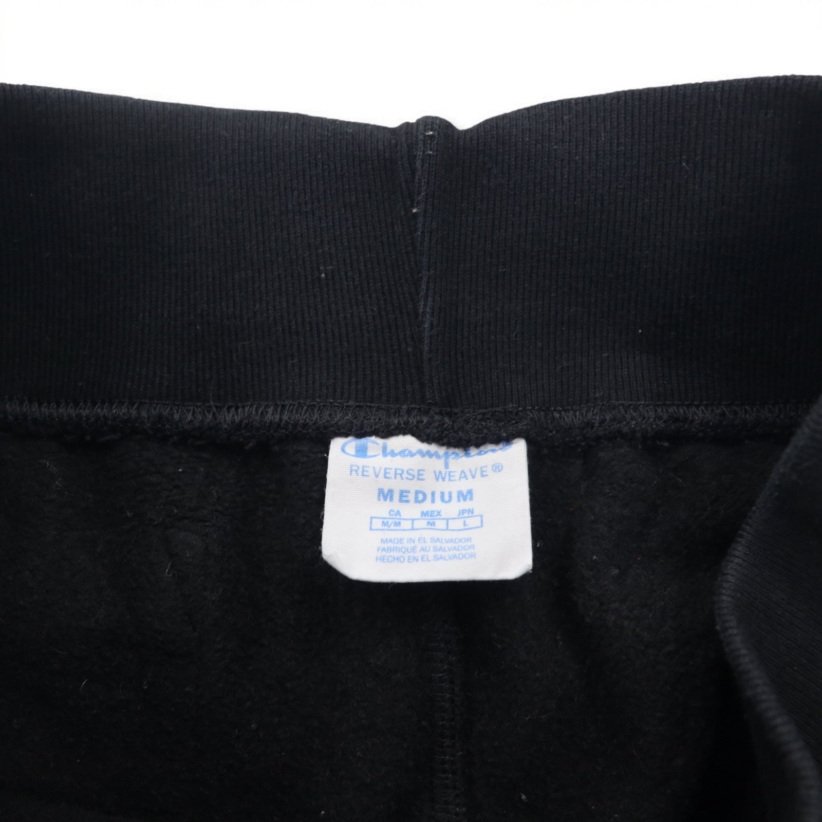 Champion Reverse Weave Pantaloni della tuta L Neri Logo Script Etichetta blu singola Replica Fabbricati a El Salvador
