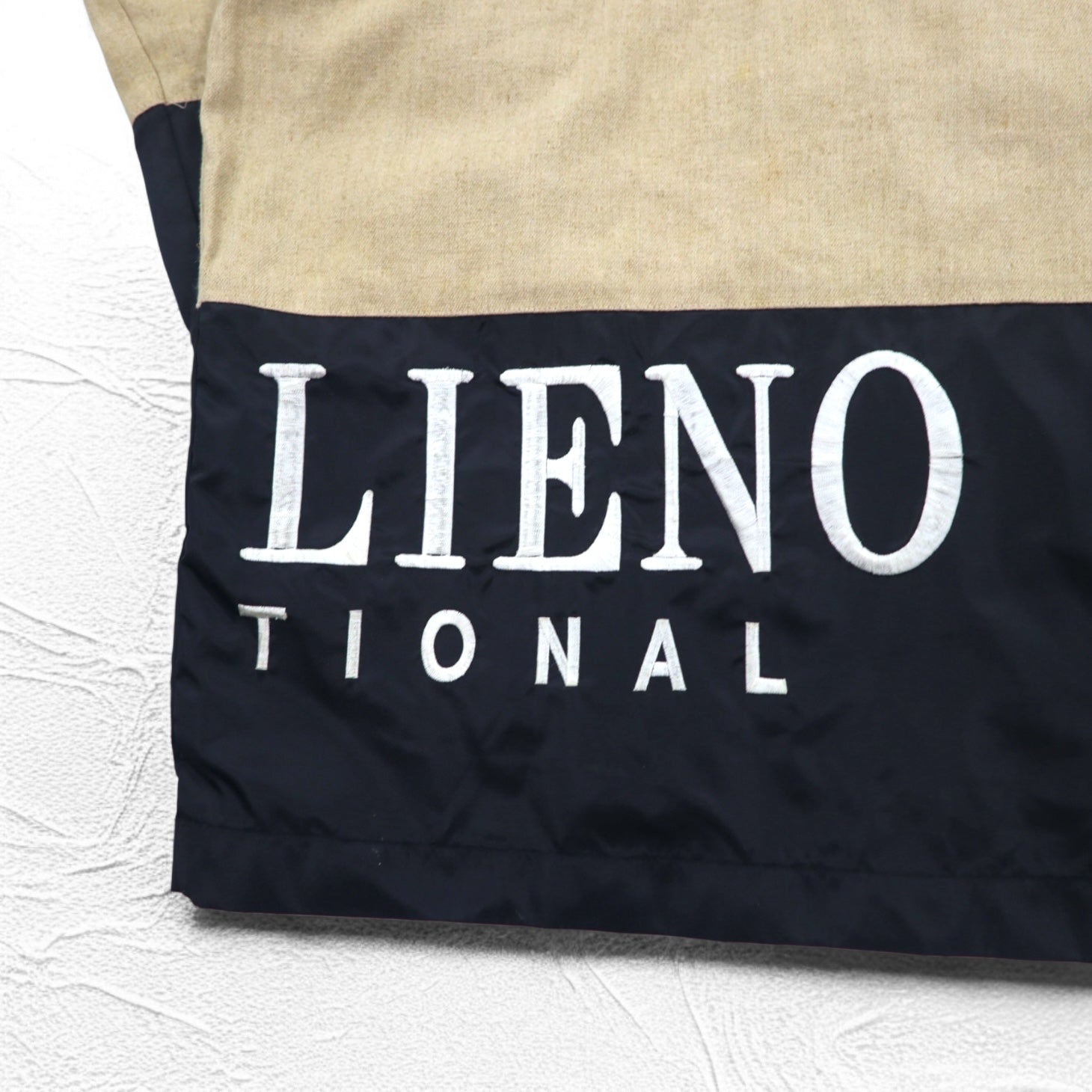 Anni '90 DON PELIENO Giacca in nylon con cappuccio XL nera, inserti in materiali diversi
