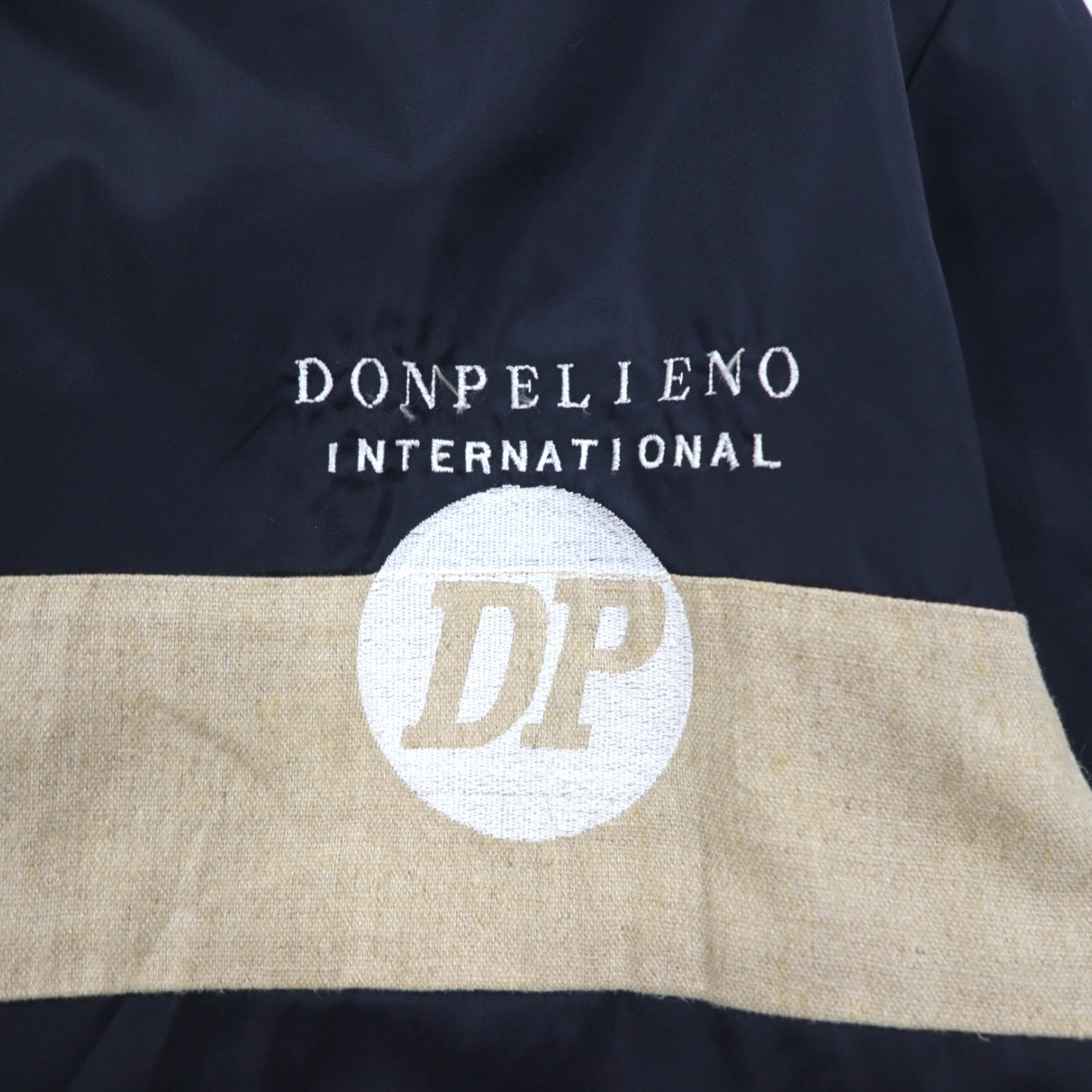 Anni '90 DON PELIENO Giacca in nylon con cappuccio XL nera, inserti in materiali diversi