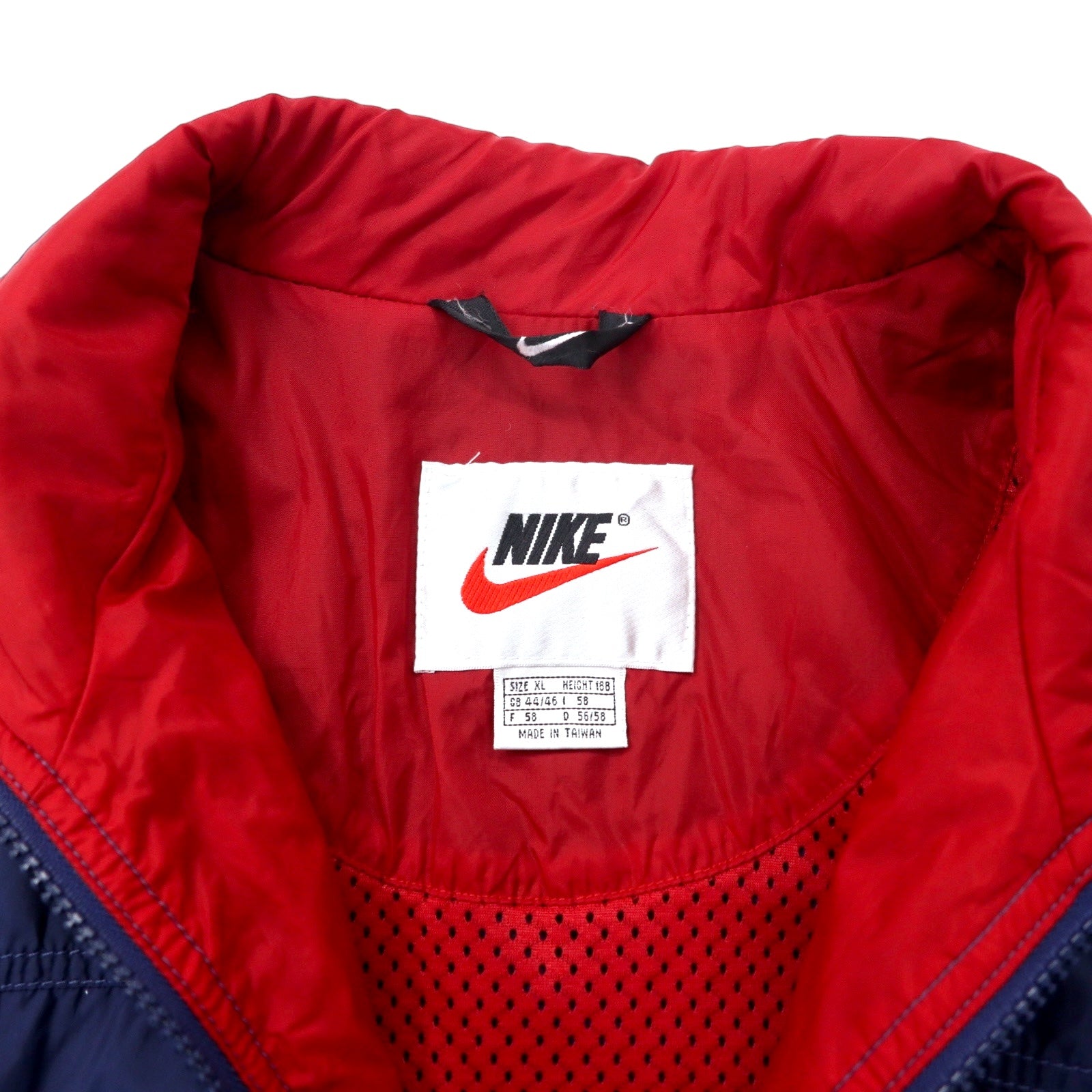 NIKE Giacca in nylon anni '90, taglia XL, blu navy, logo posteriore, logo Swoosh, etichetta argentata, oversize.