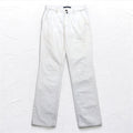 INCOTEX jeans dalla Romania, taglia M, bianchi, in cotone, modello TOMM SLIM, con patch in pelle e chiusura a zip.