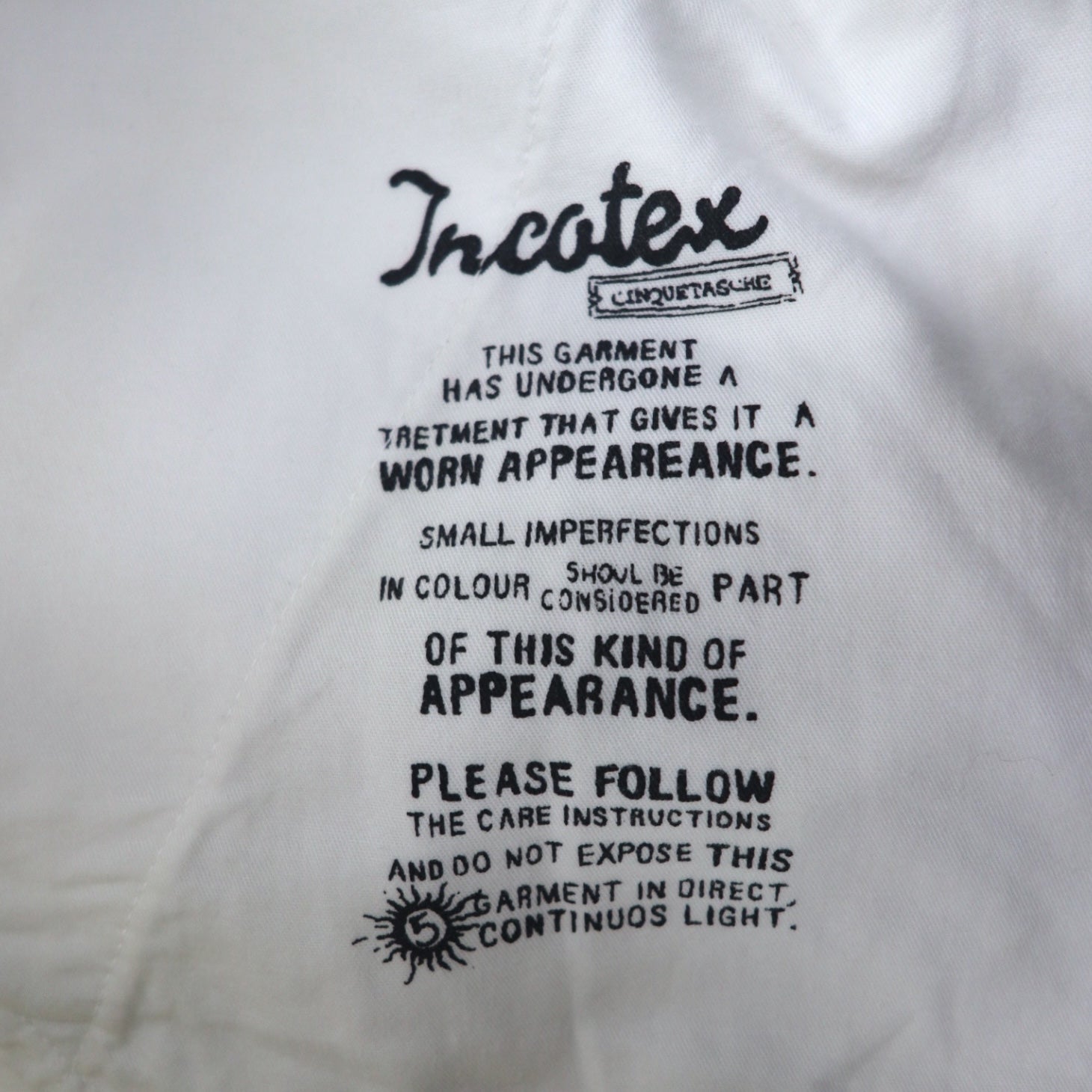 INCOTEX jeans dalla Romania, taglia M, bianchi, in cotone, modello TOMM SLIM, con patch in pelle e chiusura a zip.