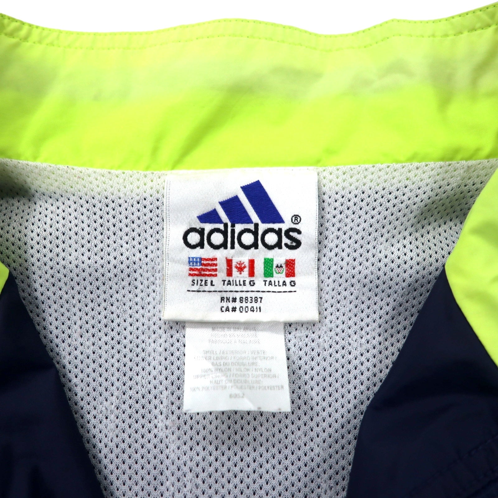 Giacca a vento Adidas anni '90, nylon, taglia L, blu navy, 3 strisce, etichetta bandiera, oversize