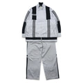 adidas anni '90, prodotta da Descente, tuta da ginnastica (giacca e pantaloni) taglia L, grigia, a 3 strisce