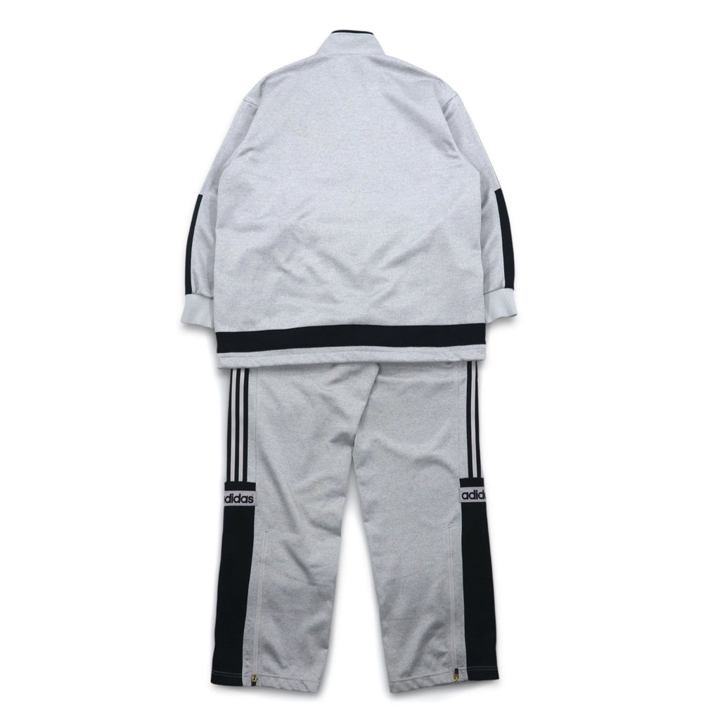 adidas anni '90, prodotta da Descente, tuta da ginnastica (giacca e pantaloni) taglia L, grigia, a 3 strisce