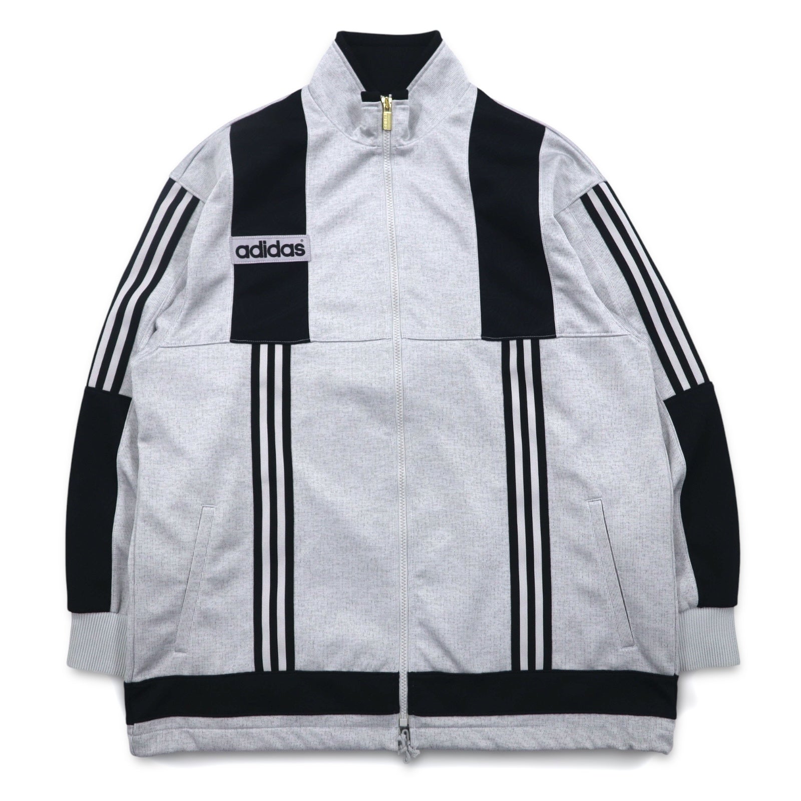 adidas anni '90, prodotta da Descente, tuta da ginnastica (giacca e pantaloni) taglia L, grigia, a 3 strisce