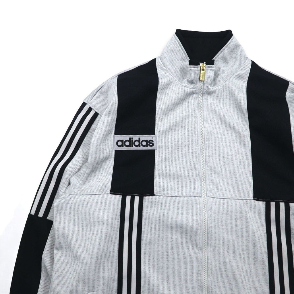 adidas anni '90, prodotta da Descente, tuta da ginnastica (giacca e pantaloni) taglia L, grigia, a 3 strisce