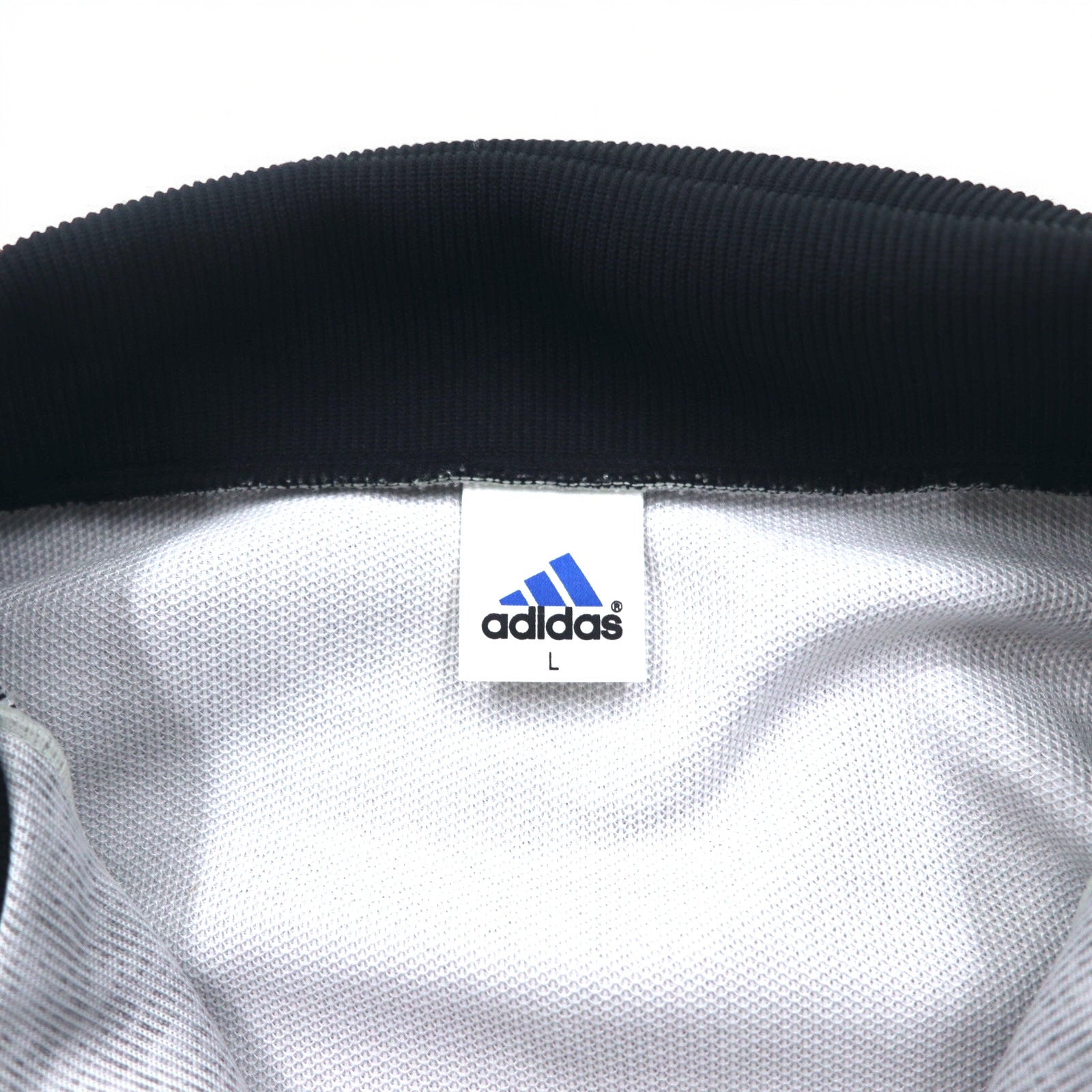 adidas anni '90, prodotta da Descente, tuta da ginnastica (giacca e pantaloni) taglia L, grigia, a 3 strisce