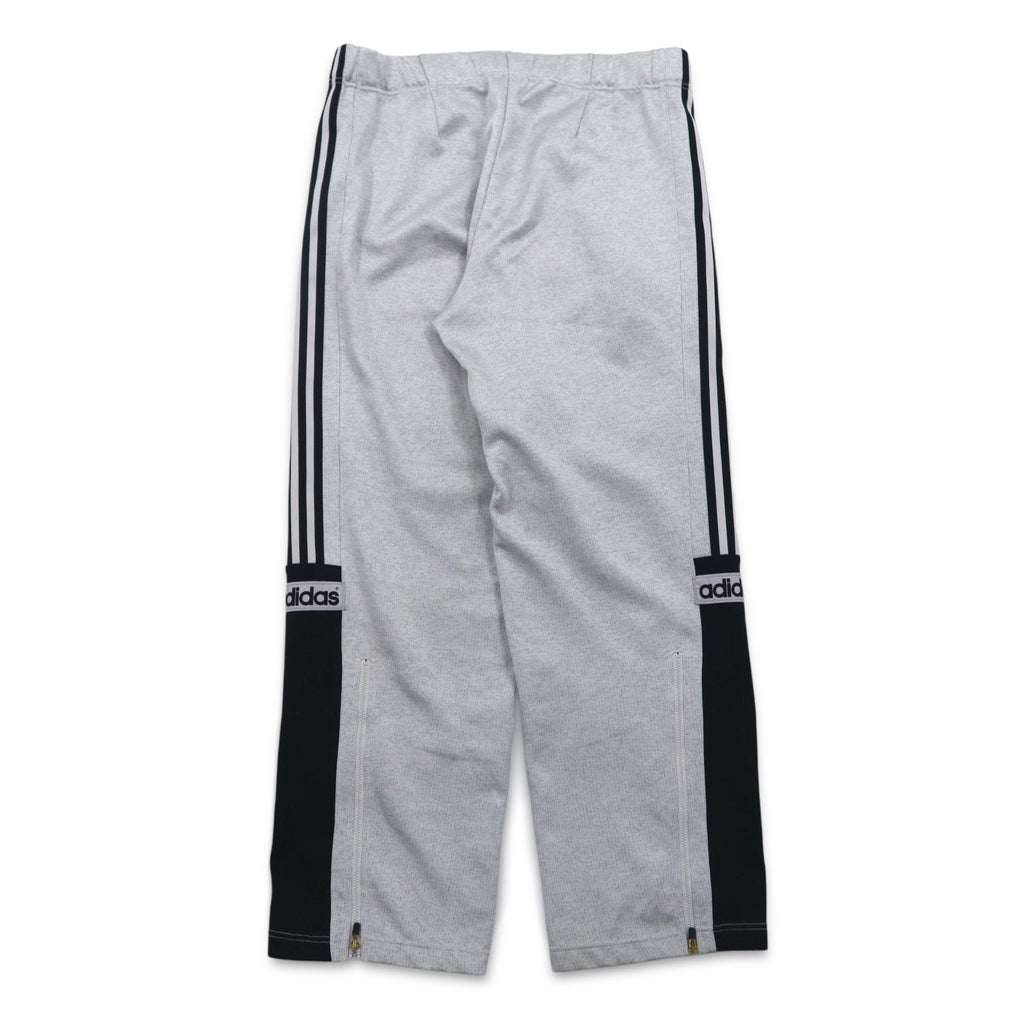 adidas anni '90, prodotta da Descente, tuta da ginnastica (giacca e pantaloni) taglia L, grigia, a 3 strisce