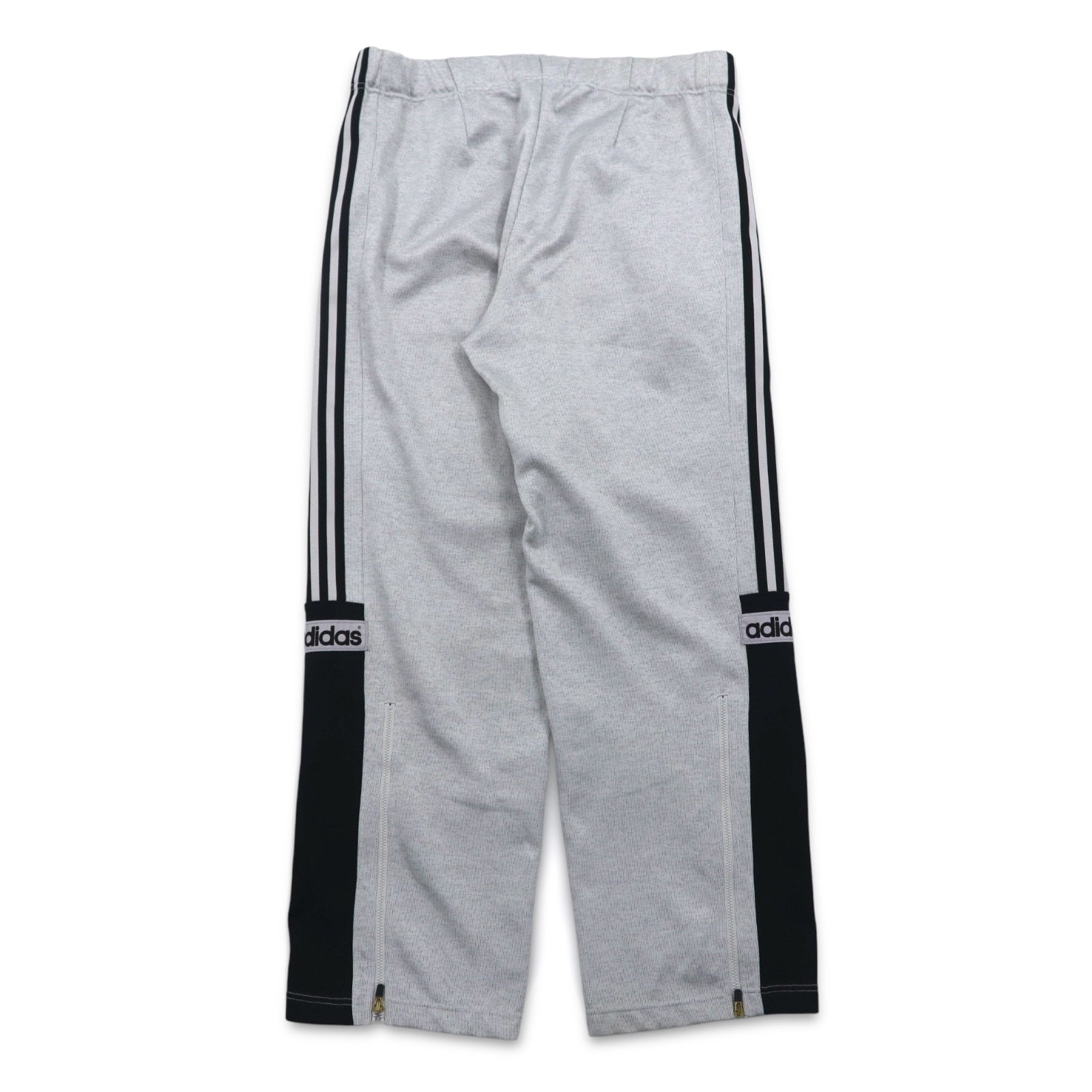 adidas anni '90, prodotta da Descente, tuta da ginnastica (giacca e pantaloni) taglia L, grigia, a 3 strisce