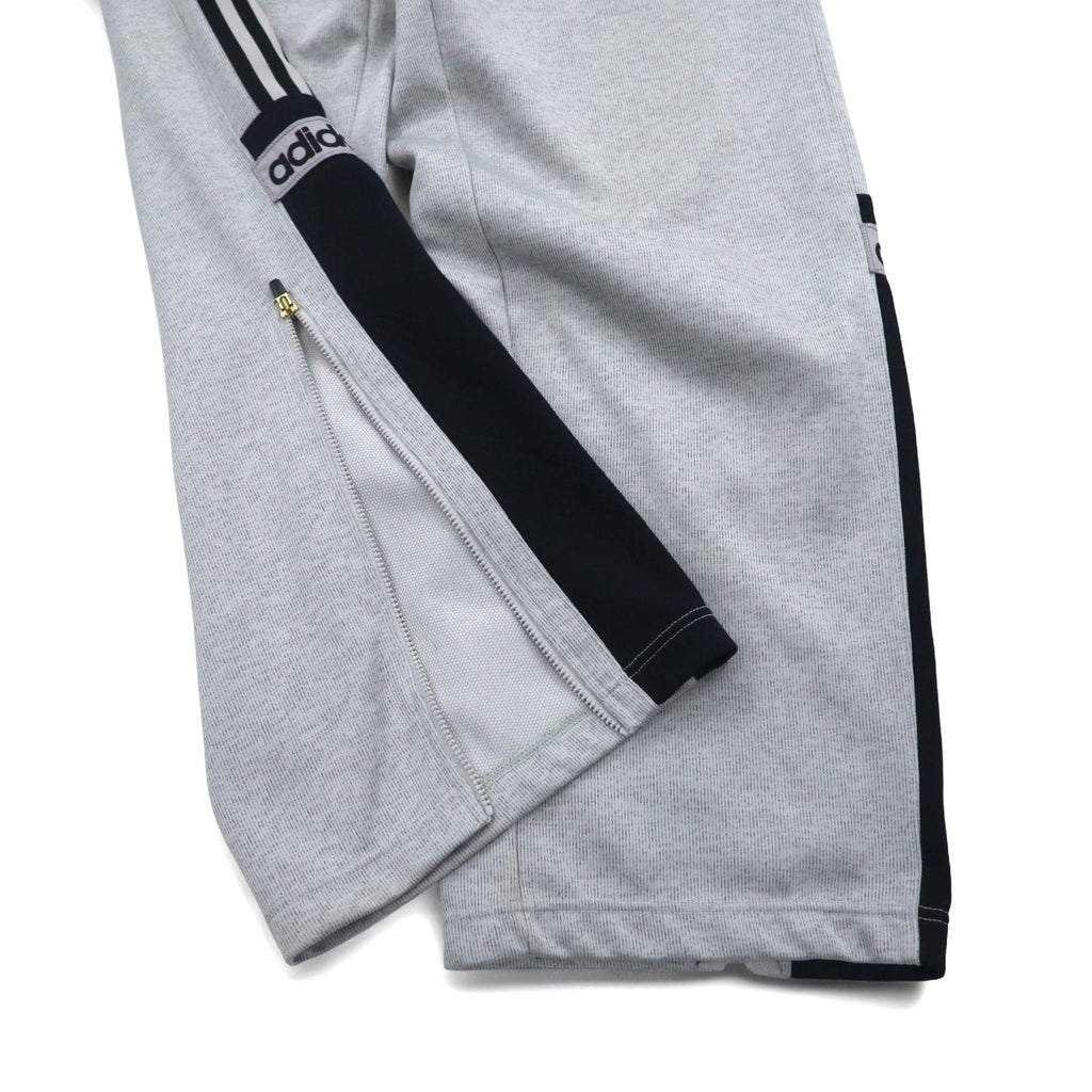 adidas anni '90, prodotta da Descente, tuta da ginnastica (giacca e pantaloni) taglia L, grigia, a 3 strisce