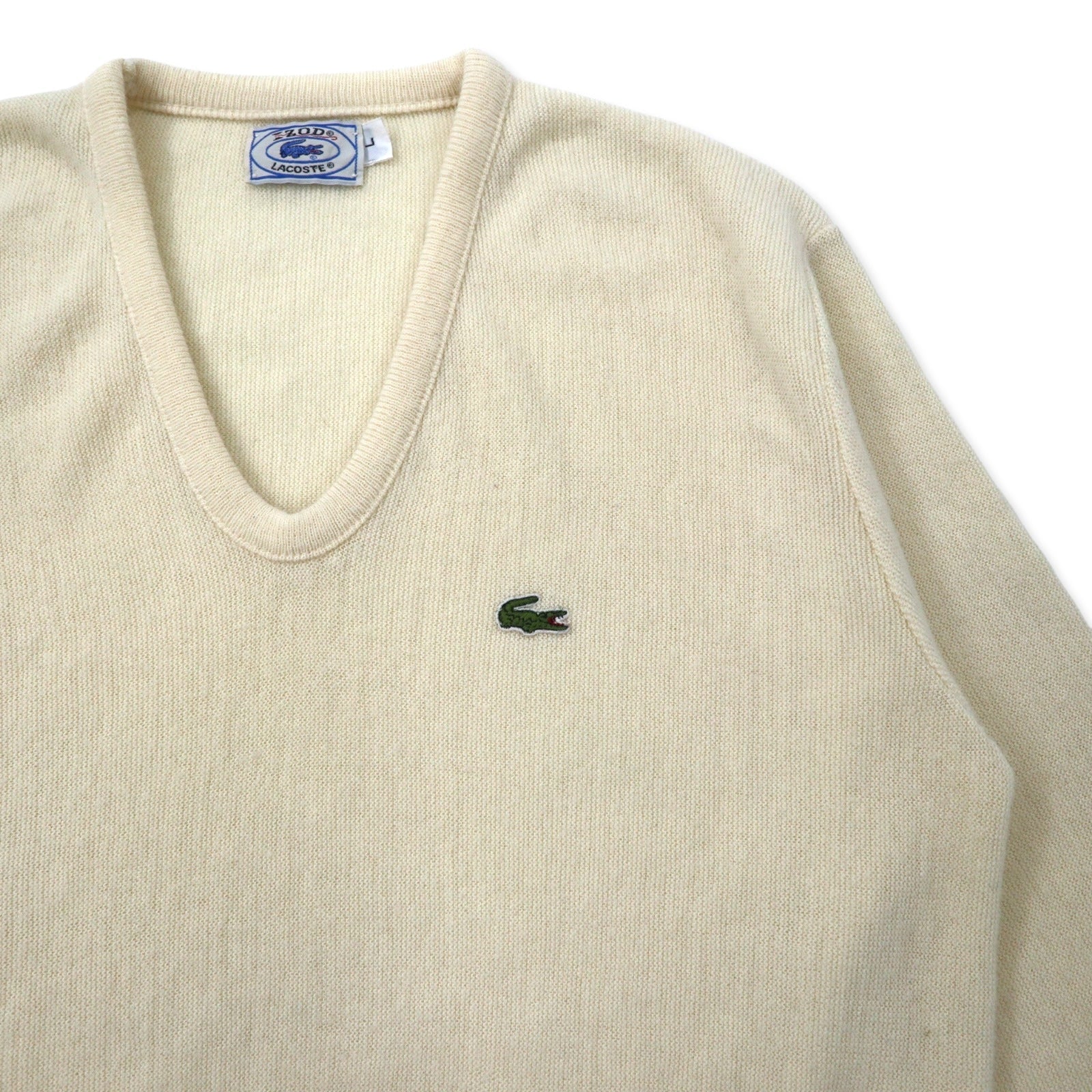 IZOD LACOSTE anni '70 maglione in acrilico scollo a V, etichetta "filo avvolto", taglia L, bianco, logo ricamato.