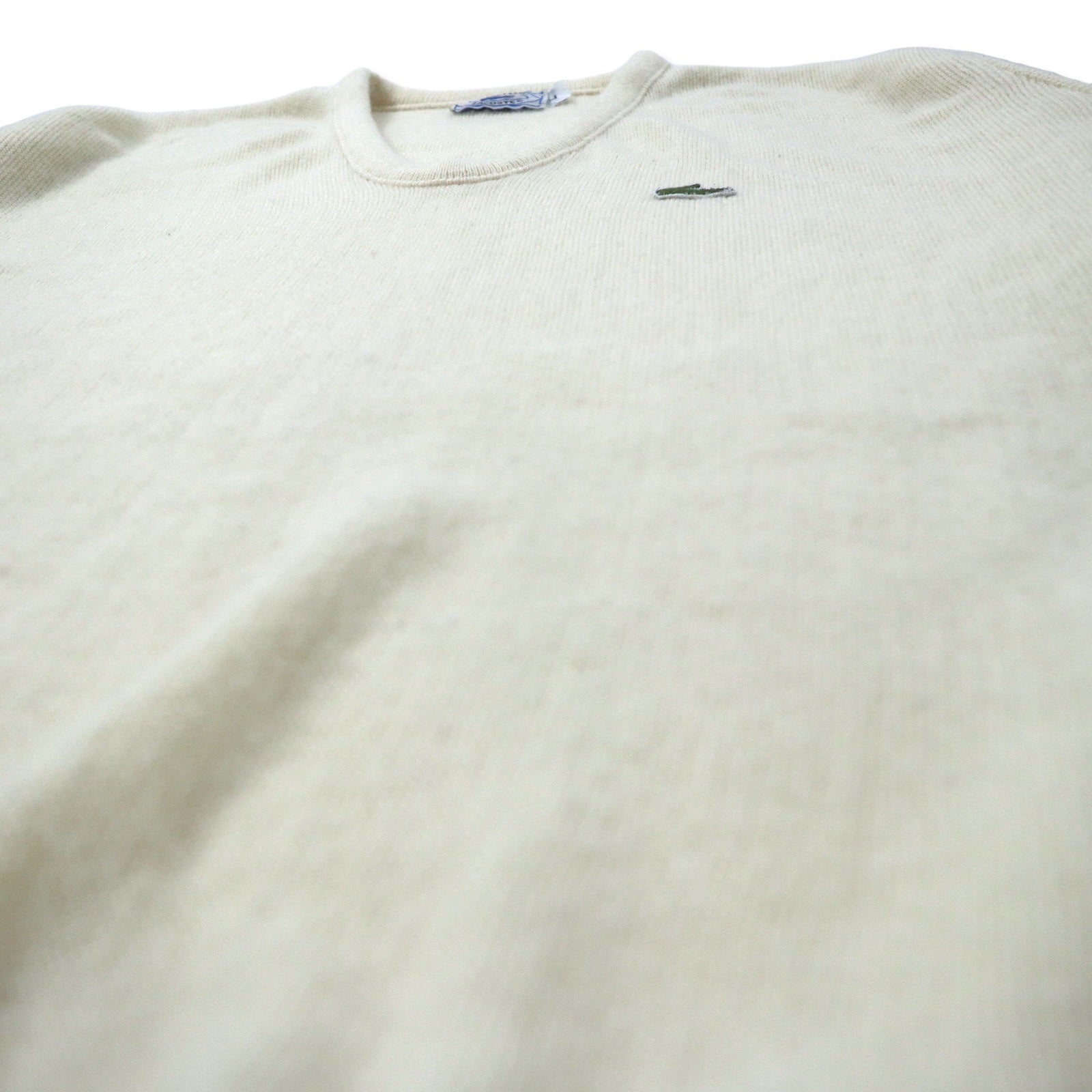 IZOD LACOSTE anni '70 maglione in acrilico scollo a V, etichetta "filo avvolto", taglia L, bianco, logo ricamato.