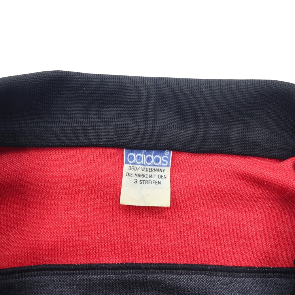 adidas, made in Germania Ovest, anni '70, giacca sportiva, tuta, taglia L, rosso e nero, poliestere, logo trifoglio, prodotta da Descente.