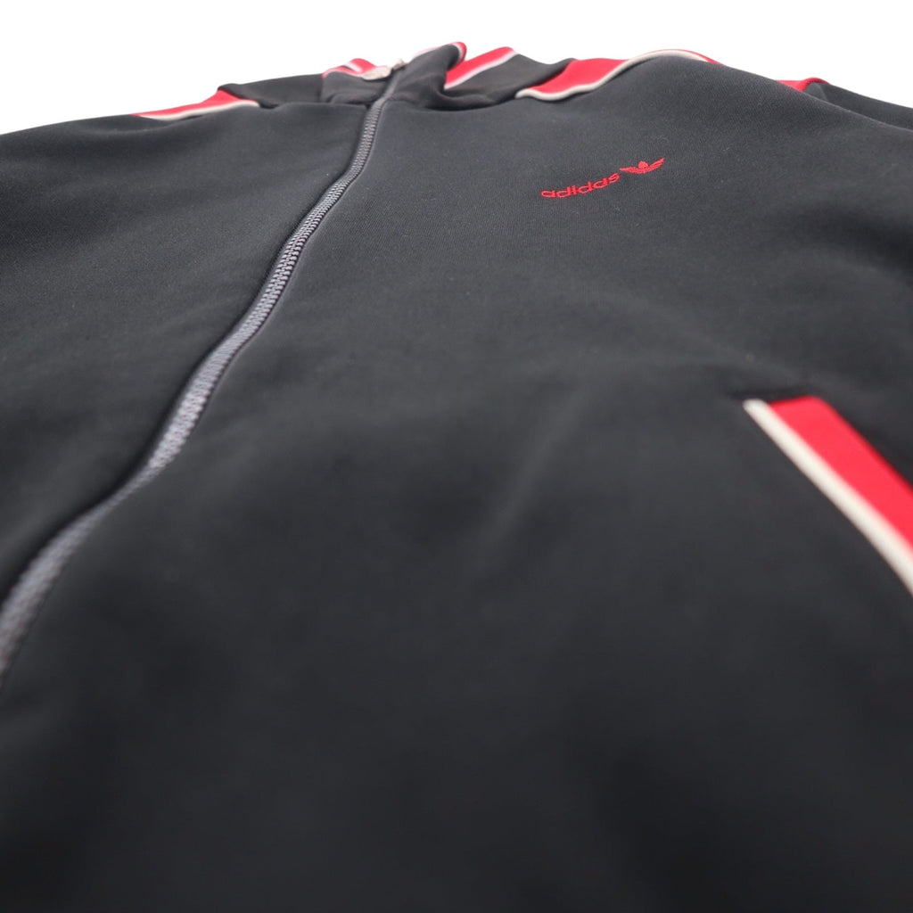 adidas, made in Germania Ovest, anni '70, giacca sportiva, tuta, taglia L, rosso e nero, poliestere, logo trifoglio, prodotta da Descente.