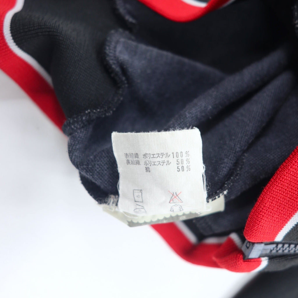 adidas, made in Germania Ovest, anni '70, giacca sportiva, tuta, taglia L, rosso e nero, poliestere, logo trifoglio, prodotta da Descente.