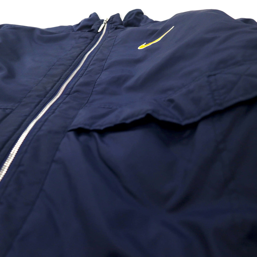 NIKE anni '90 logo Swoosh giacca imbottita in nylon M blu navy, ricamo logo posteriore, fodera trapuntata, etichetta argento