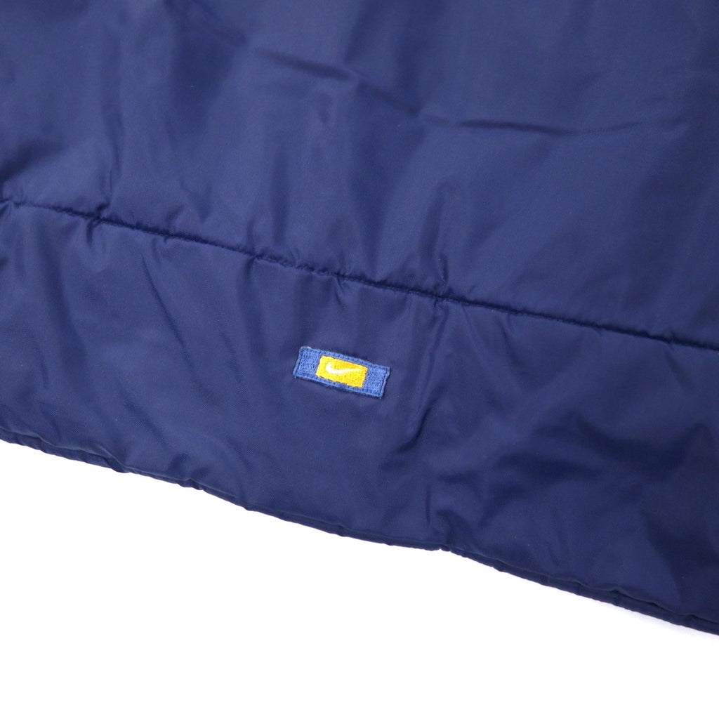NIKE anni '90 logo Swoosh giacca imbottita in nylon M blu navy, ricamo logo posteriore, fodera trapuntata, etichetta argento