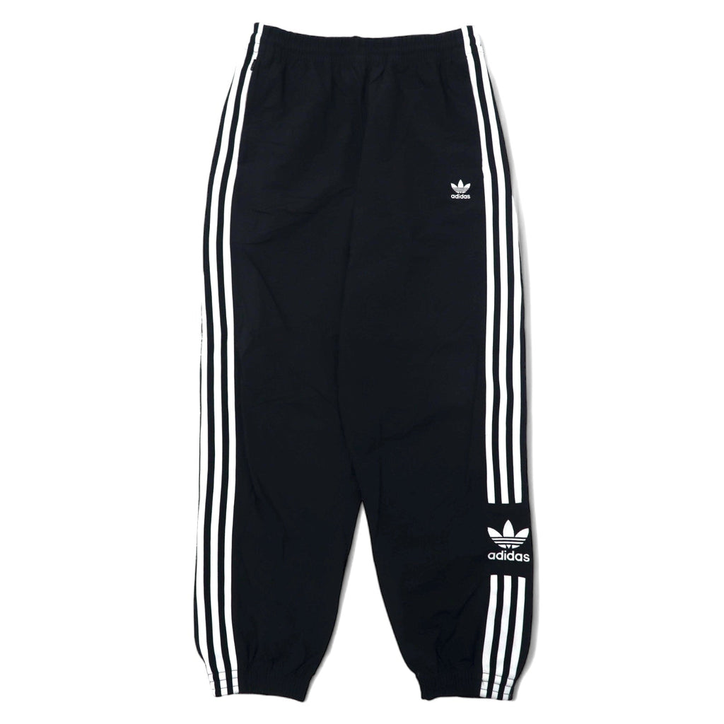 adidas originals Pantaloni da tuta XOT neri in nylon con logo a trifoglio 3 strisce LOCK UP TRACK PANTS ED7542