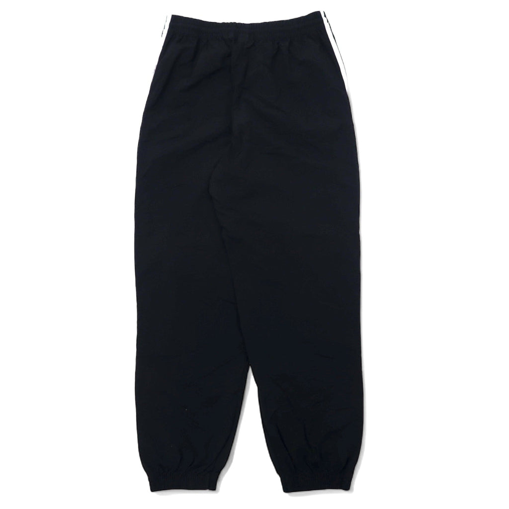 adidas originals Pantaloni da tuta XOT neri in nylon con logo a trifoglio 3 strisce LOCK UP TRACK PANTS ED7542