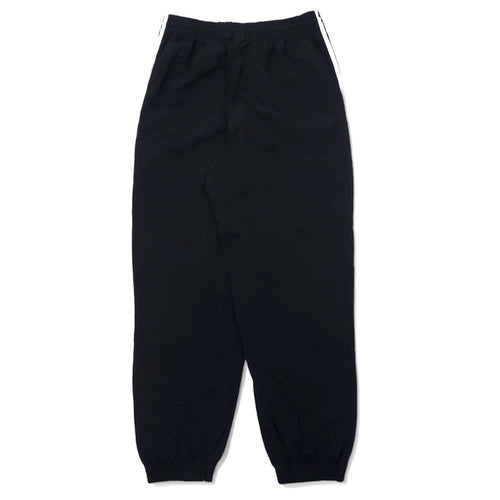 adidas originals Pantaloni da tuta XOT neri in nylon con logo a trifoglio 3 strisce LOCK UP TRACK PANTS ED7542