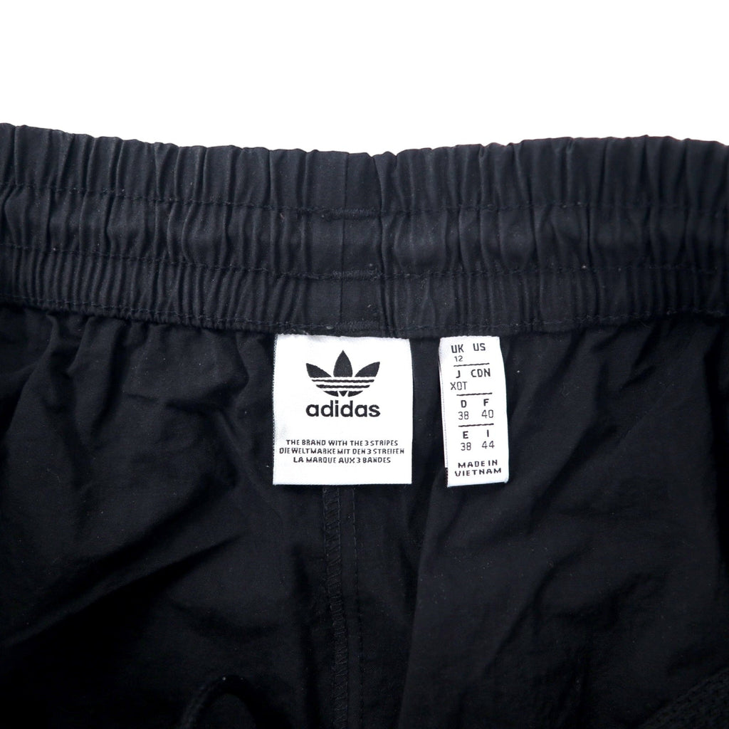 adidas originals Pantaloni da tuta XOT neri in nylon con logo a trifoglio 3 strisce LOCK UP TRACK PANTS ED7542
