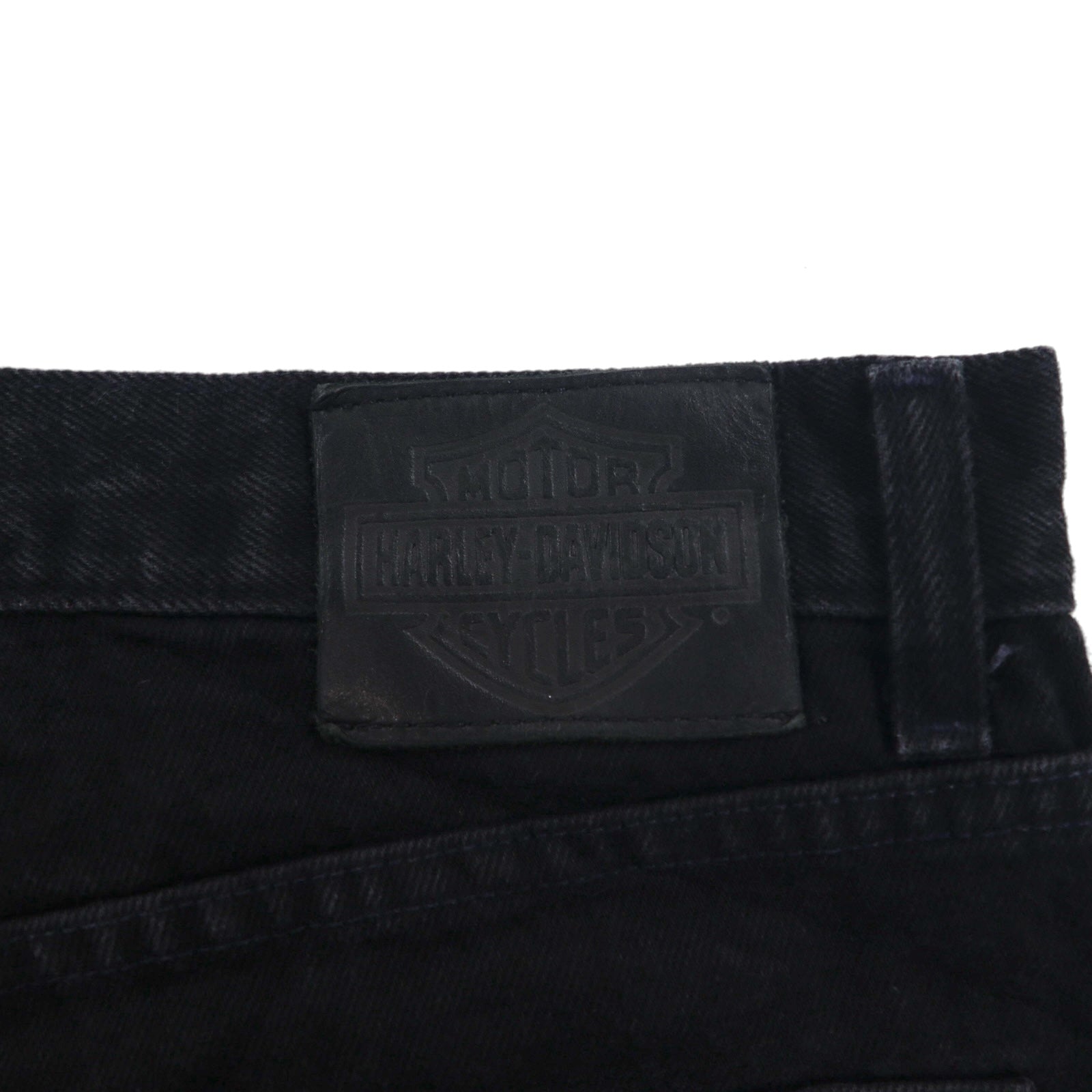 HARLEY DAVIDSON Pantaloni in denim neri anni 2000, taglia L, toppa in pelle, cerniera, made in Mexico