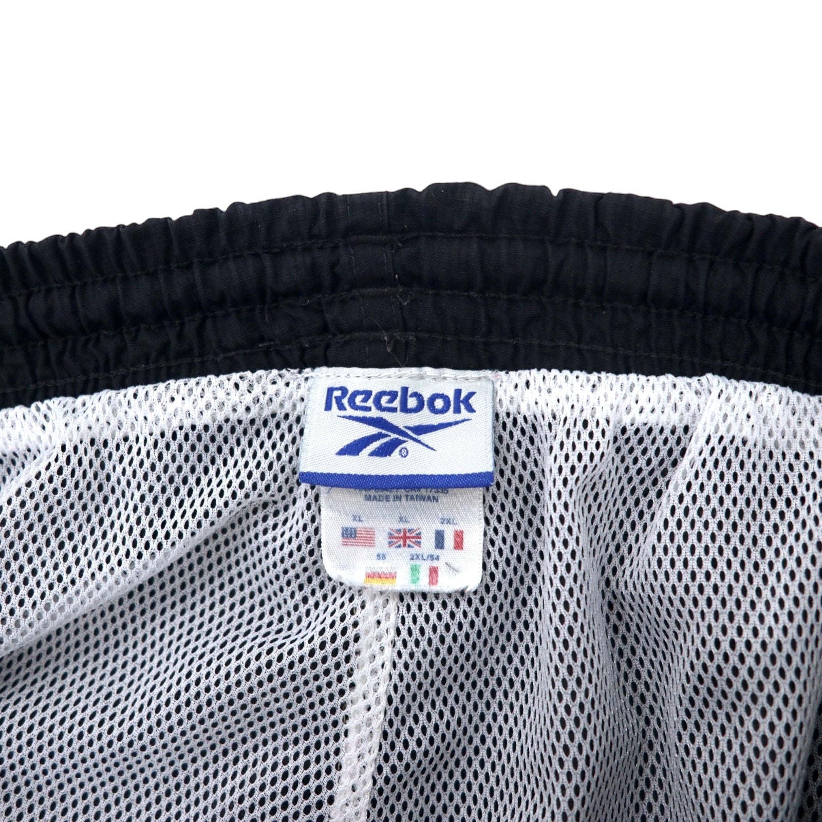 Reebok Pantaloni della tuta anni '90 Tuta sportiva XL Nero Poliestere Strisce laterali Logo vettoriale