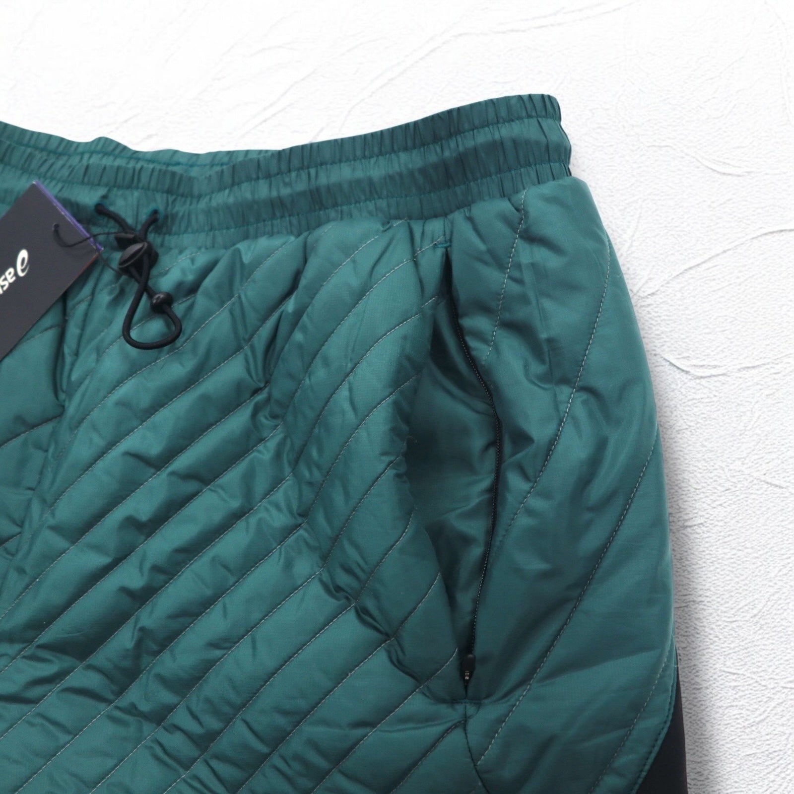 Kiko Kostadinov × Asics Pantaloni trapuntati isolanti M Verde 19AW INSULATION PANTS Nuovo