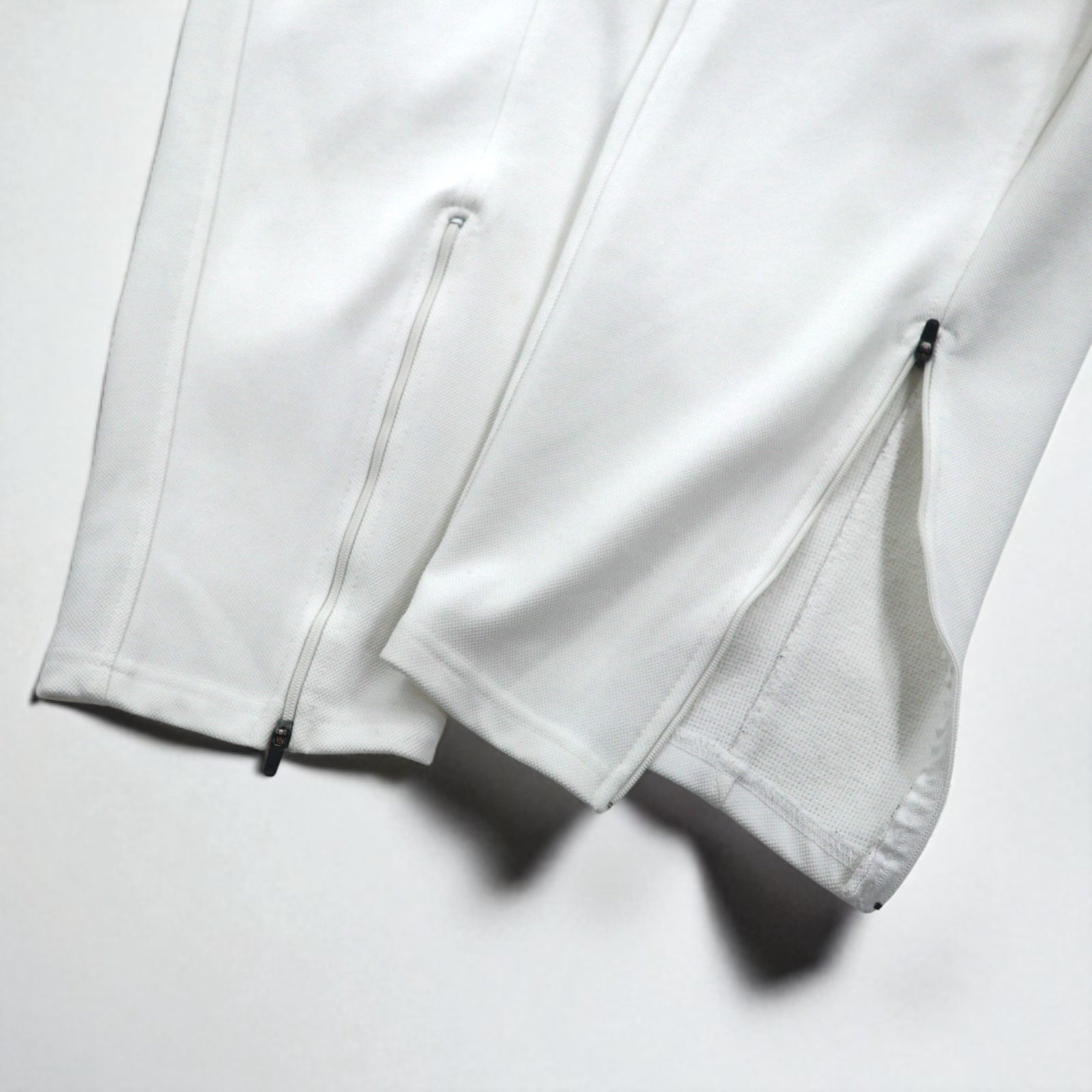Champion anni '90, pantaloni sportivi, tuta, XL, bianchi, poliestere, cerniera alle caviglie, spacchi, made in Japan
