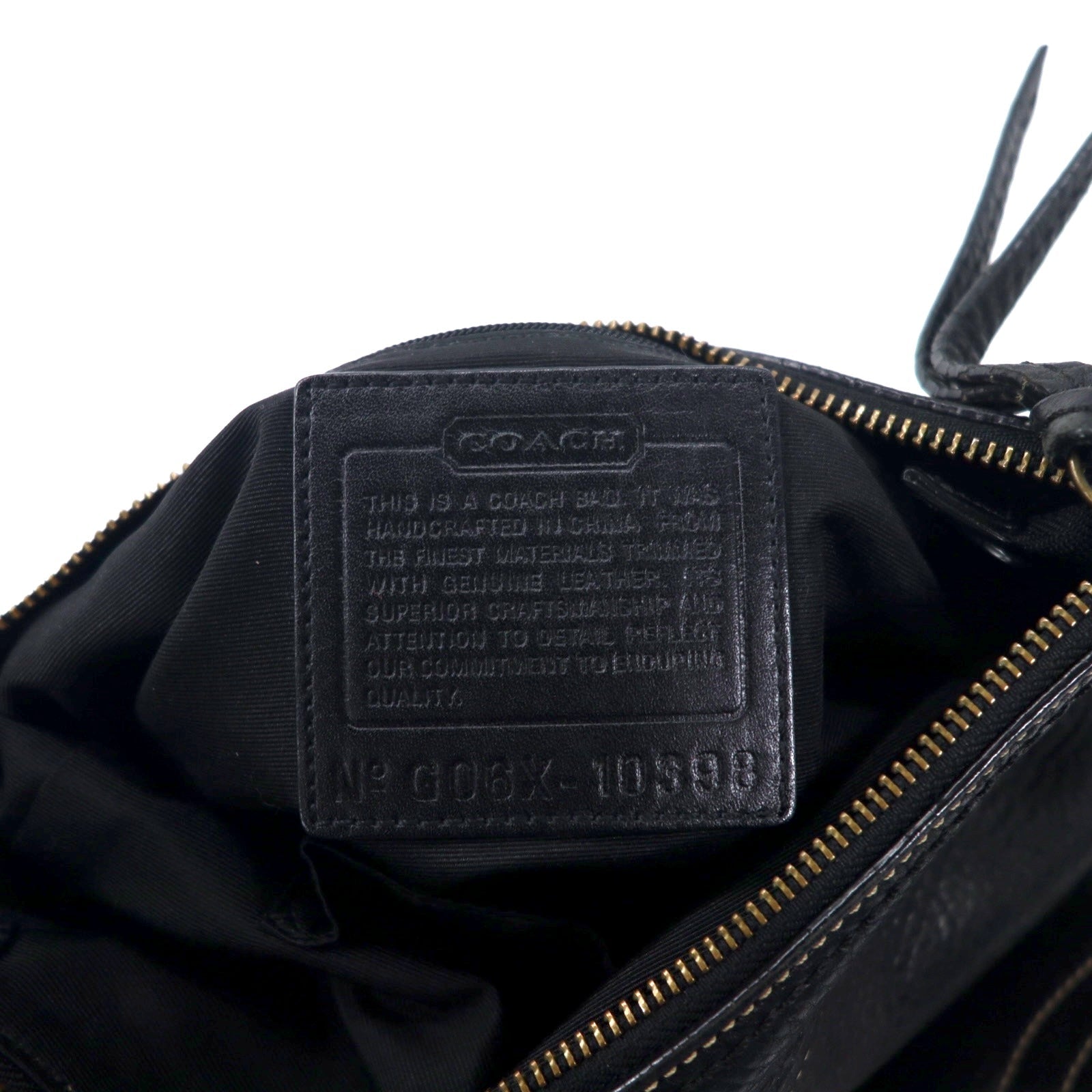 COACH Borsa a tracolla in pelle Duffle nera con cuciture 10398