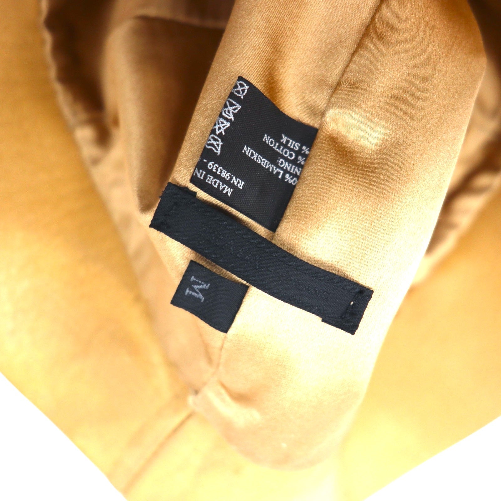 PRADA Cappello a secchiello in pelle di agnello traforata, taglia M, colore beige