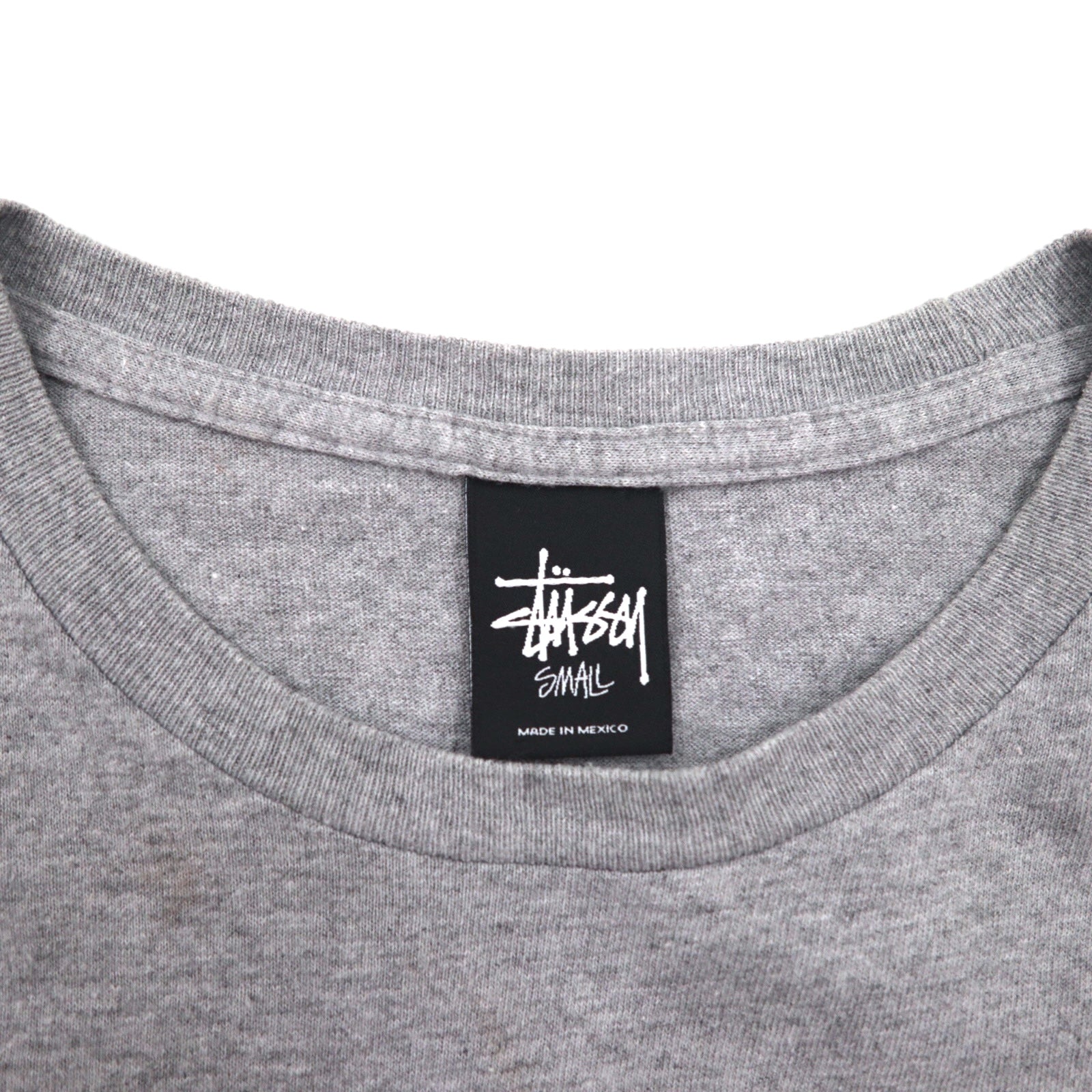 T-shirt STUSSY con stampa logo Chanel, taglia S, grigia, in cotone, made in Mexico