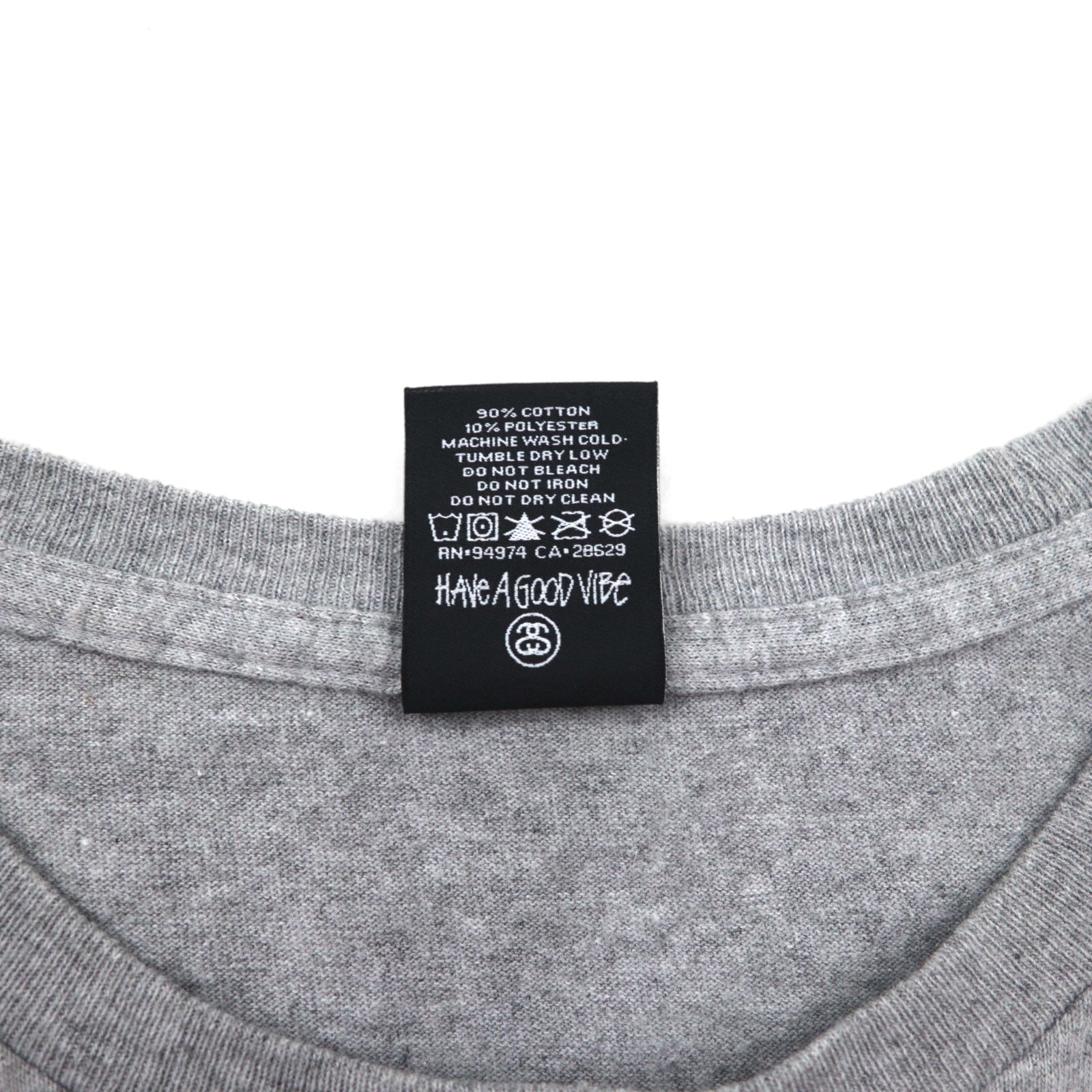 T-shirt STUSSY con stampa logo Chanel, taglia S, grigia, in cotone, made in Mexico
