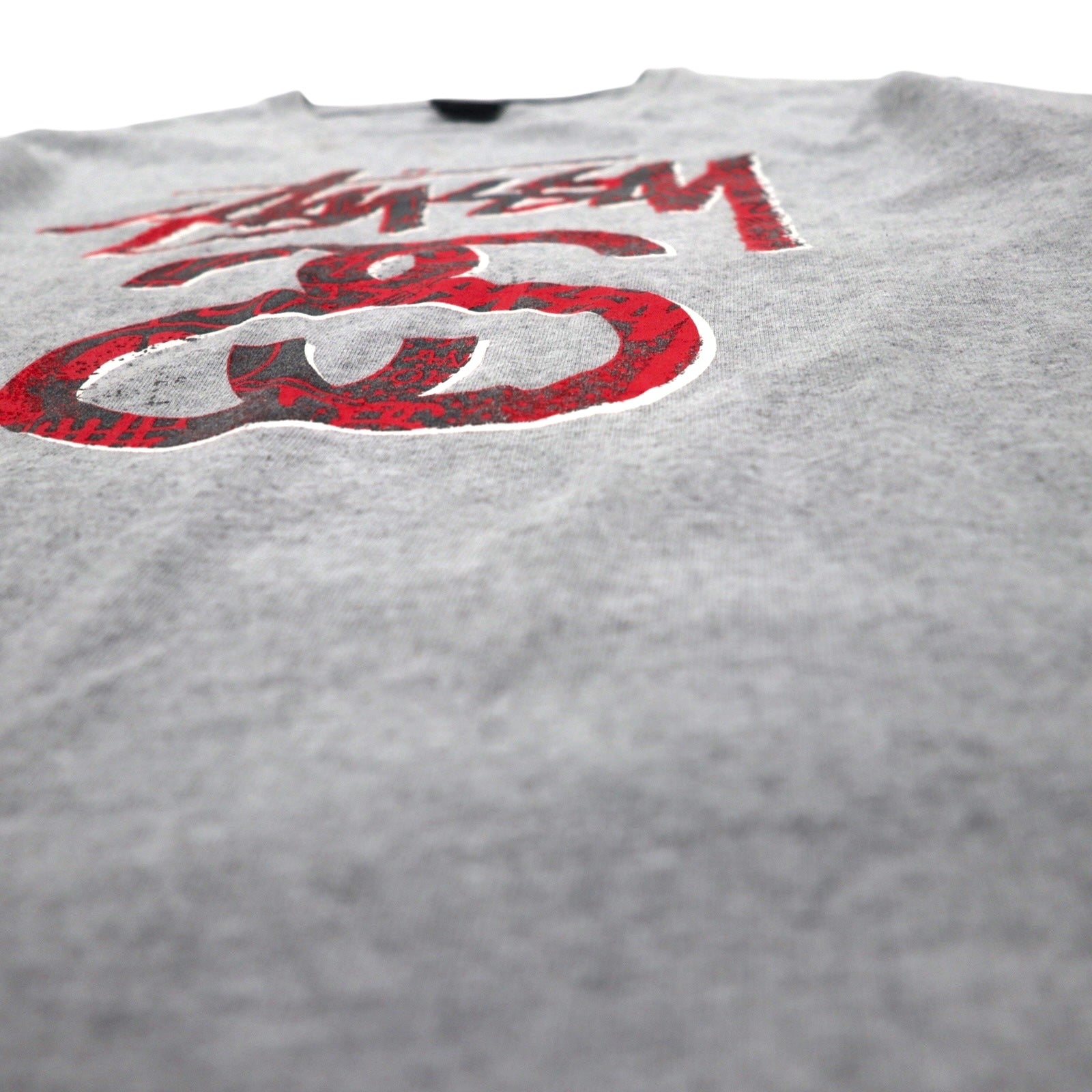 T-shirt STUSSY con stampa logo Chanel, taglia S, grigia, in cotone, made in Mexico