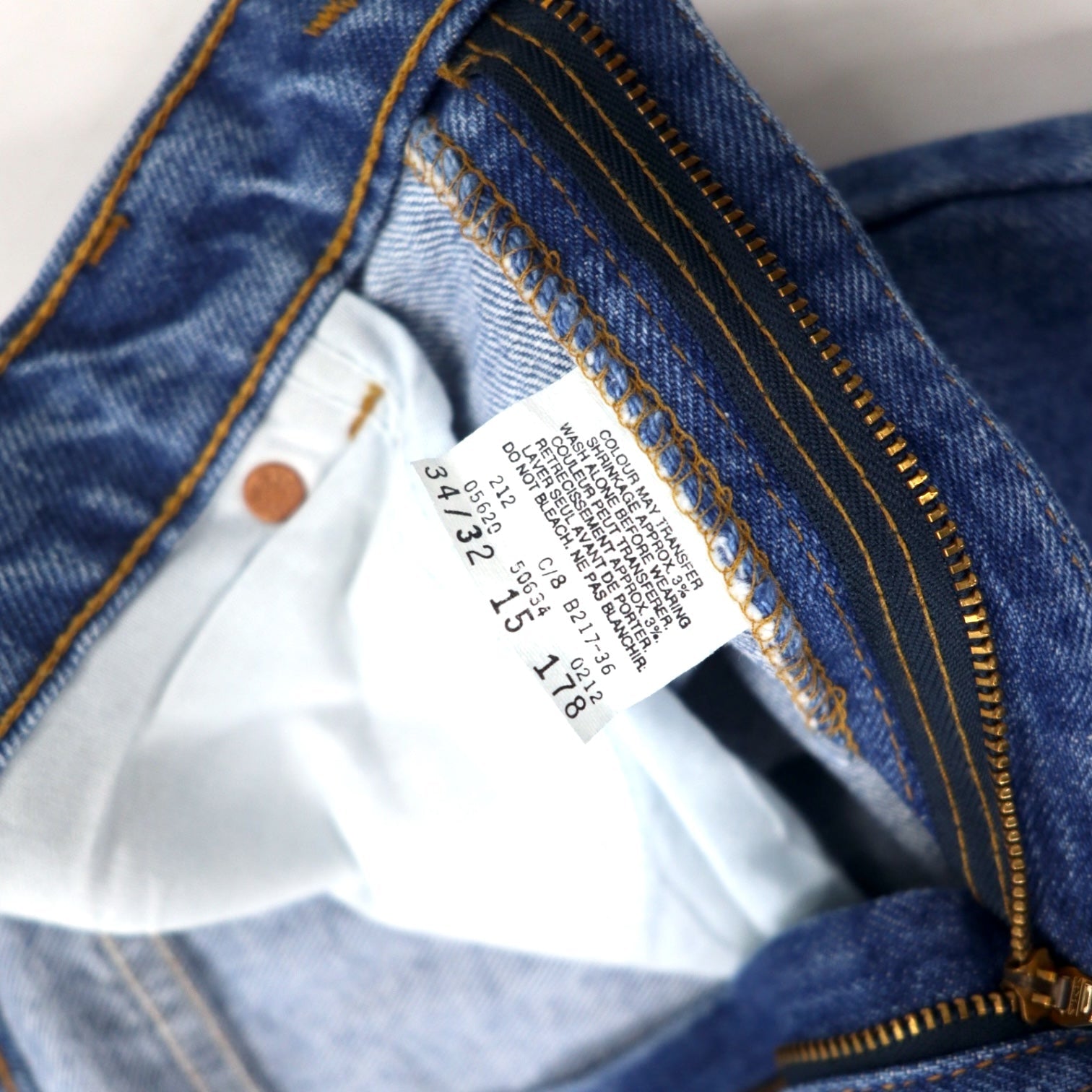 Levi's made in Canada anni '90 etichetta arancione 634 pantaloni in denim affusolati a sacchetto 34 blu cotone cerniera sulla patta bottone retro 212