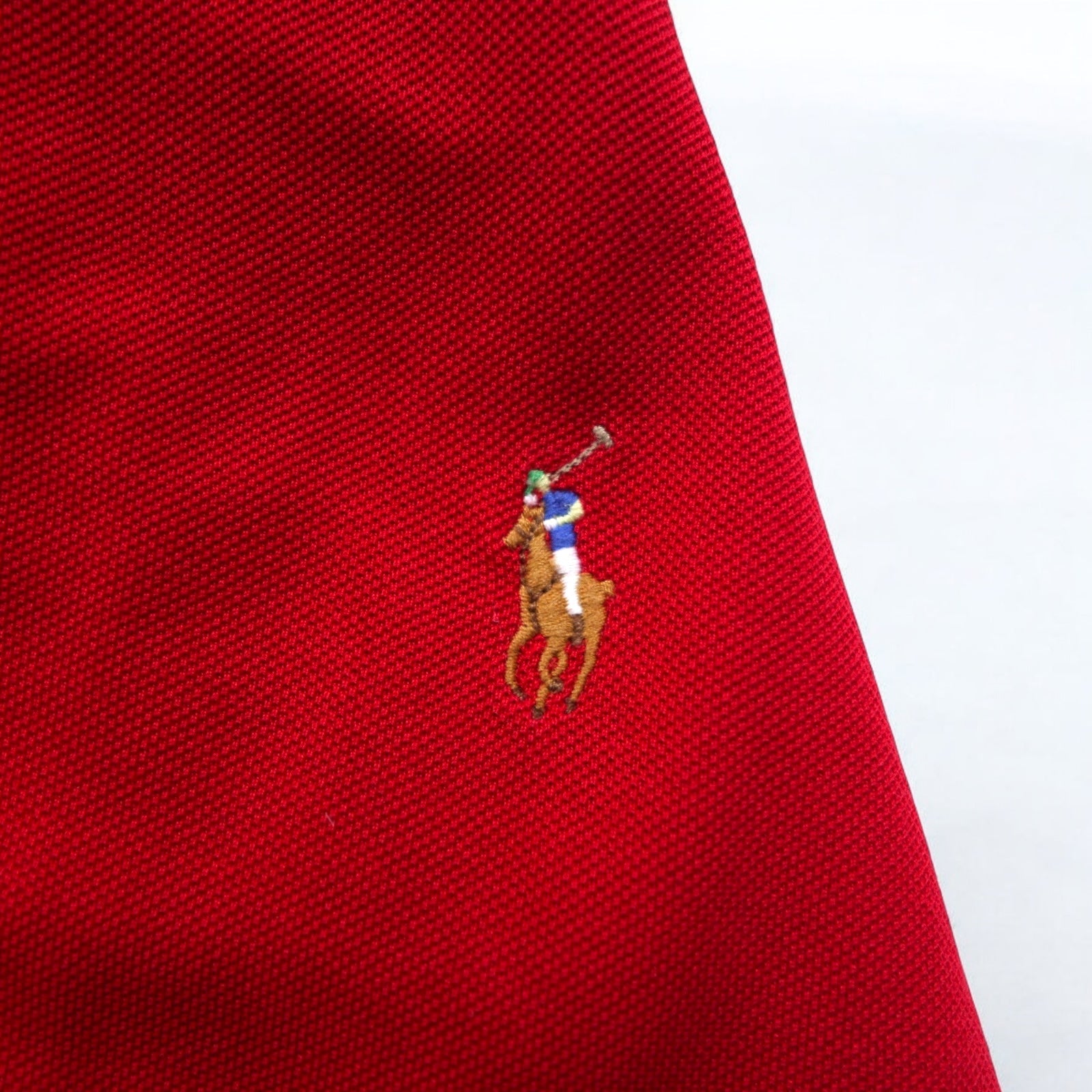 Polo by Ralph Lauren anni '90, polo a maniche lunghe, taglia L, rossa, in pima cotton piqué, con piccolo pony ricamato, made in Perù.