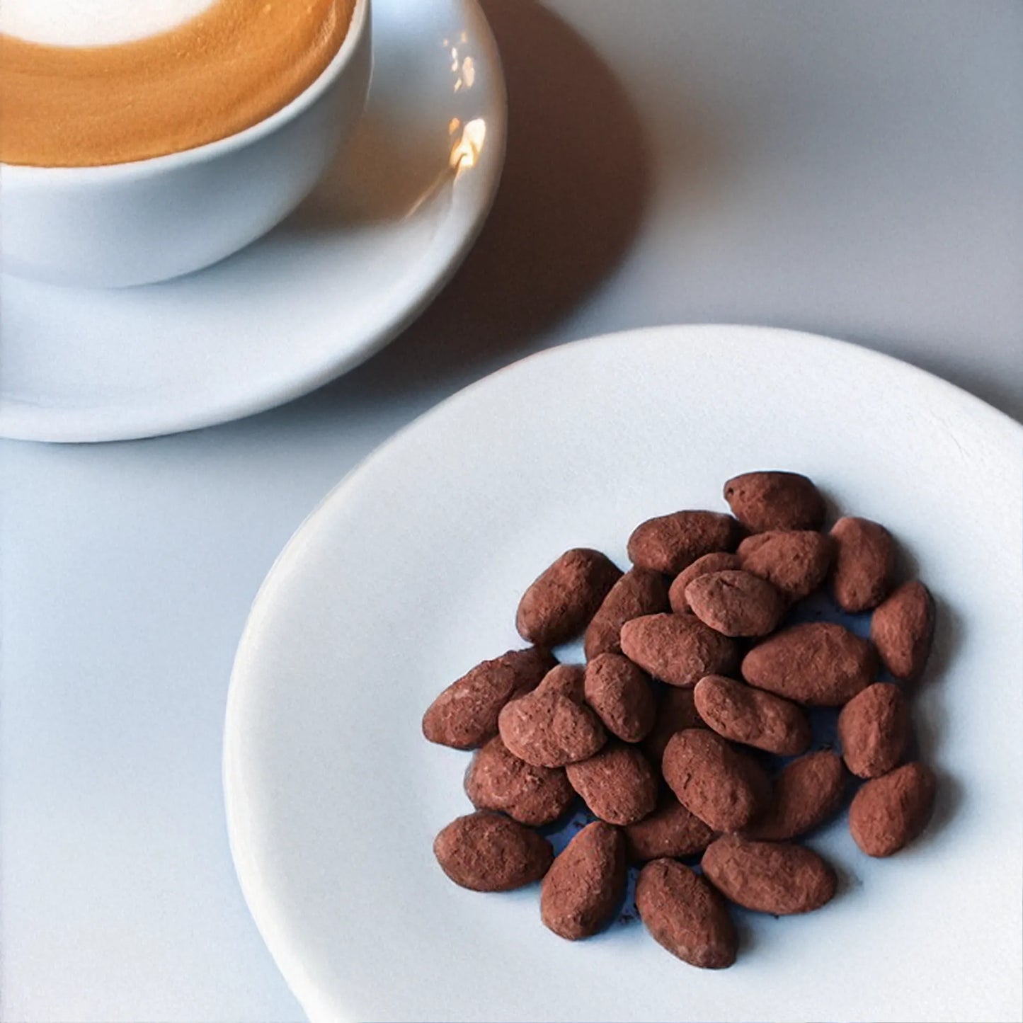 Mandorle ricoperte di cioccolato, 7,8 g di carboidrati per sacchetto