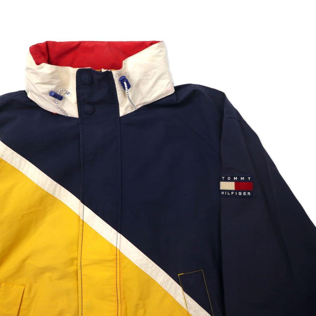 TOMMY HILFIGER Giacca a vela anni '90 L Giallo Blu navy Nylon Cappuccio a scomparsa