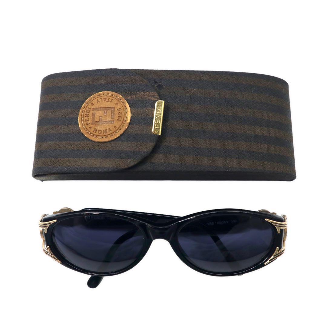 FENDI Occhiali da sole con montatura in celluloide, neri, oro, logo laterale, moneta, FS 138 EBONY 130, vintage, Made in Italy